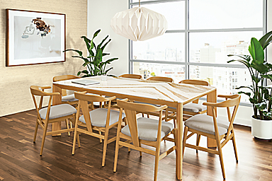 Detail of Pren table in white oak with Cambria Brittanica Gold top with Evan arm chairs.