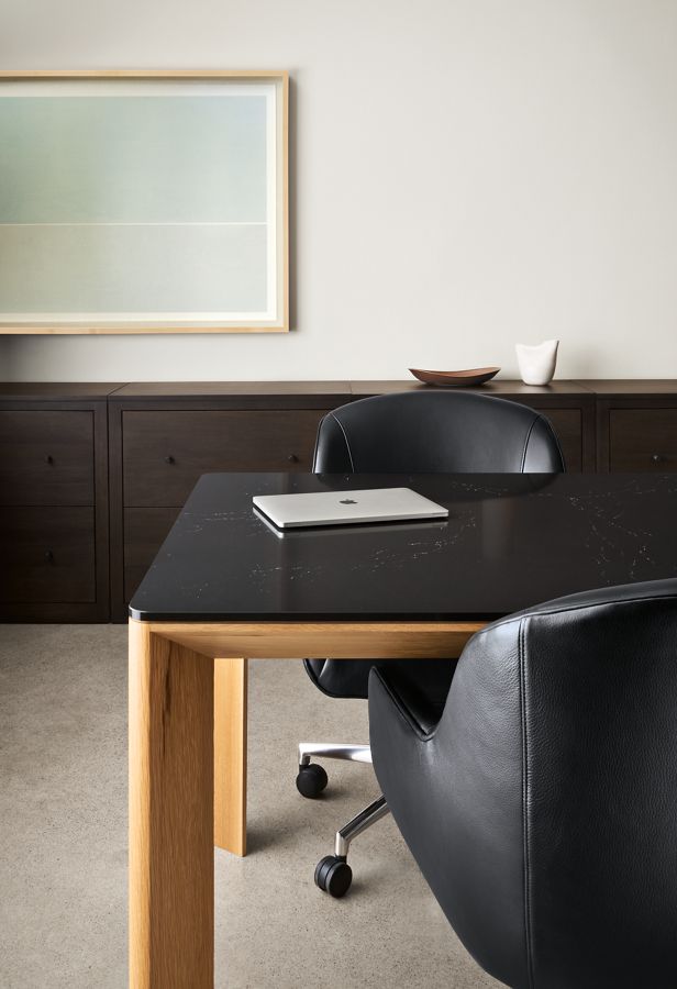 Office setting with Pren desk with quartz top and Nico office chair in urbino black.