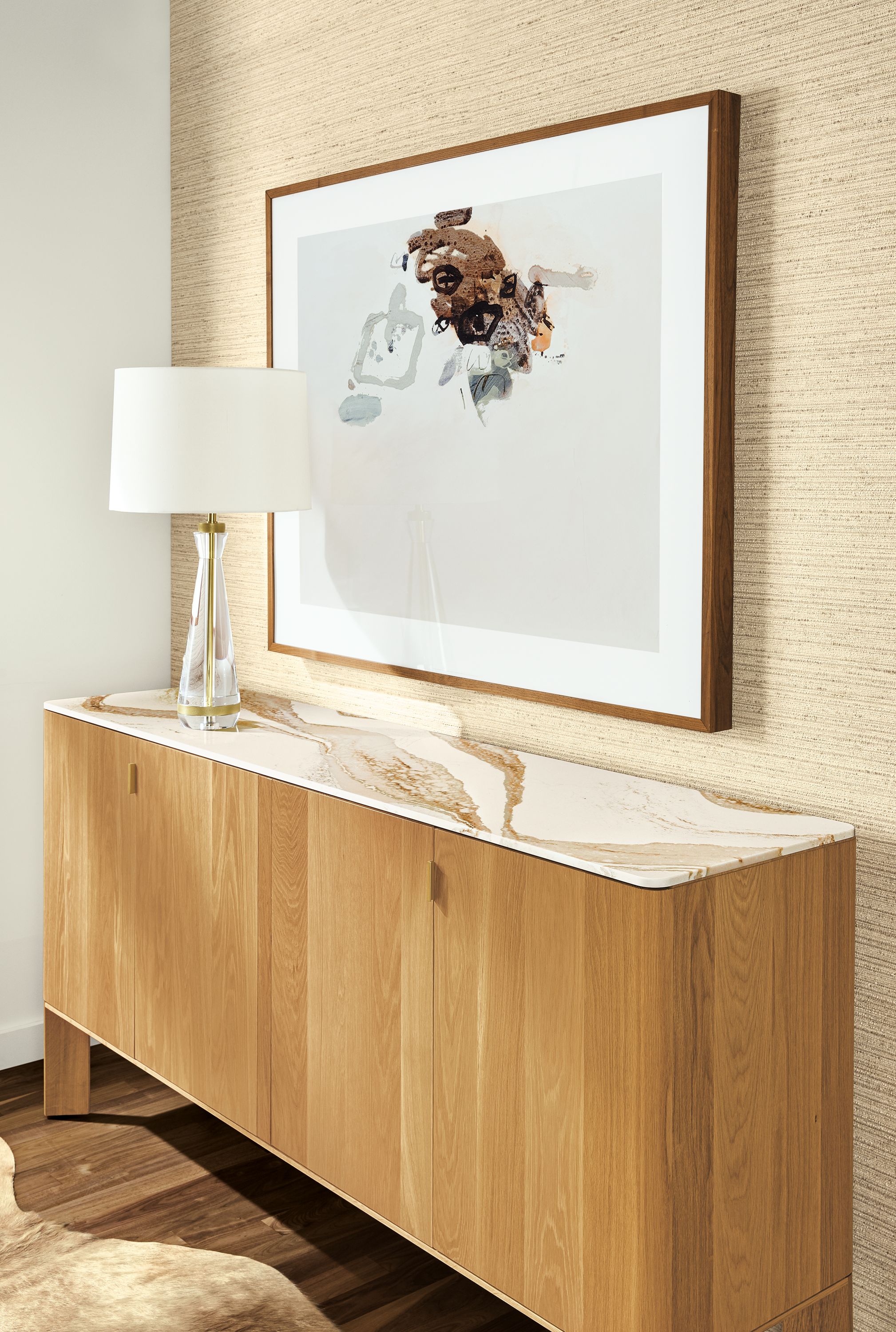 Detail of Pren storage cabinet in white oak with Cambria Brittanica Gold top.