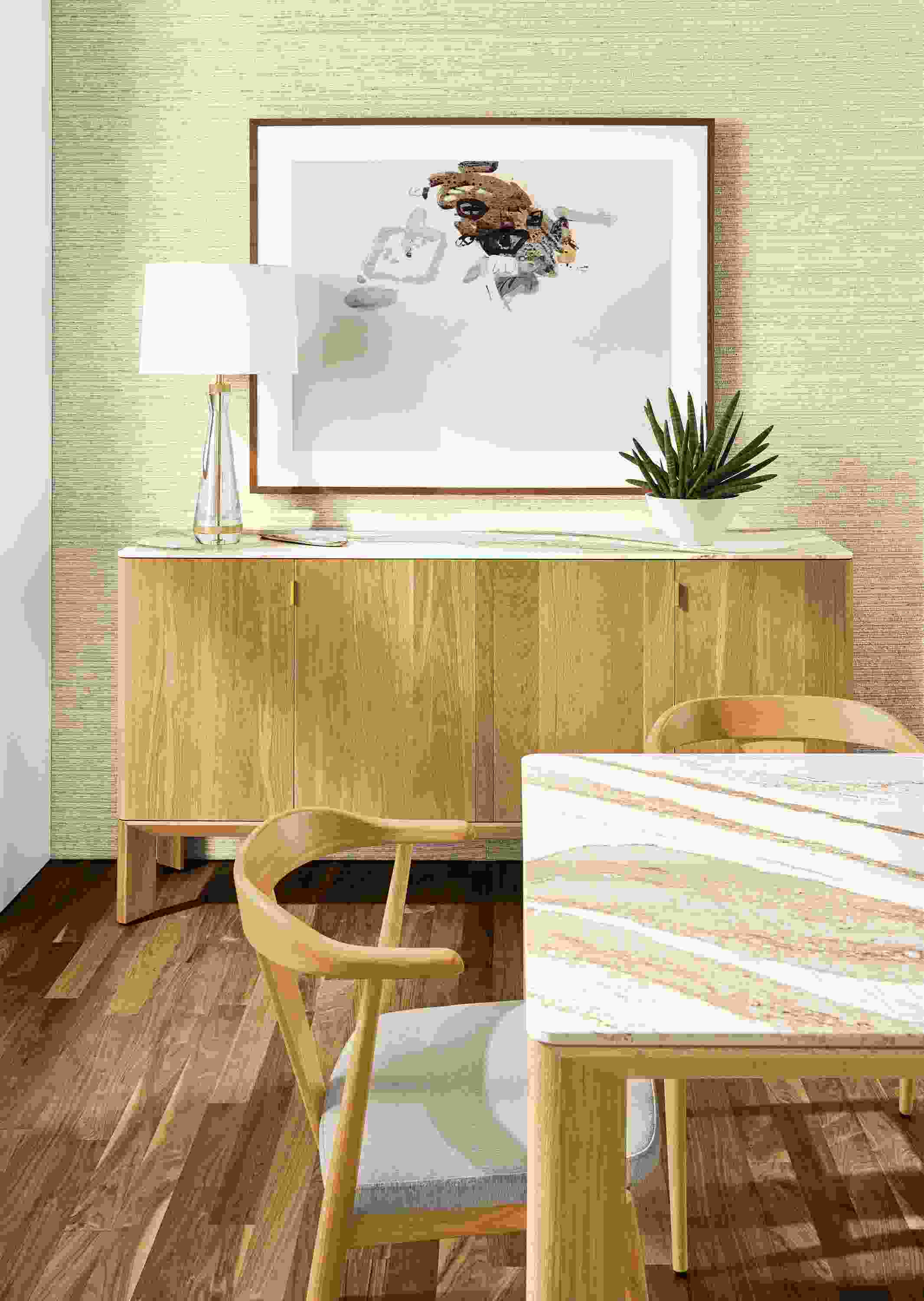 Detail of Pren storage cabinet in white oak with Cambria Brittanica Gold top in conference room.