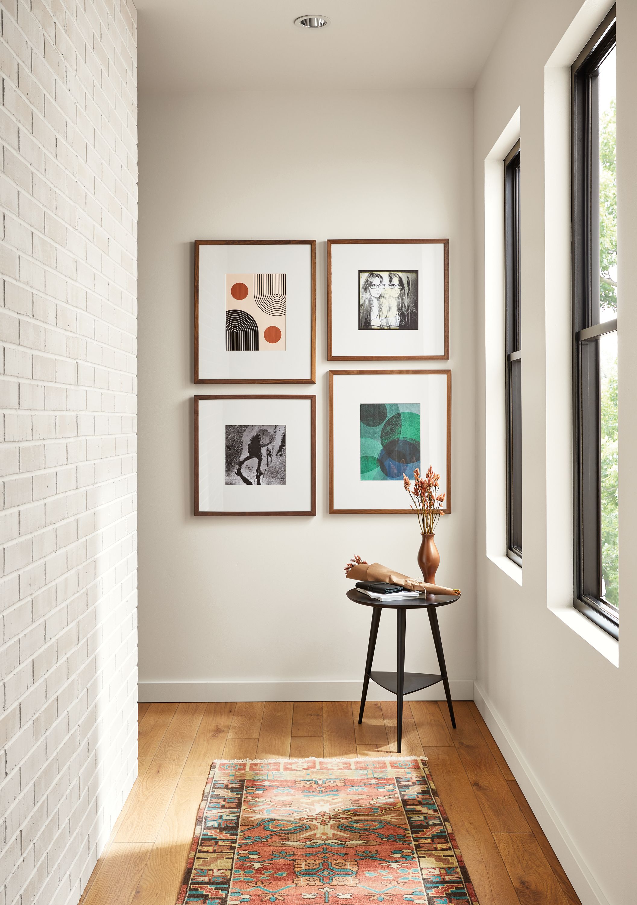 Entryway with Profile mixed grid frame set in walnut.