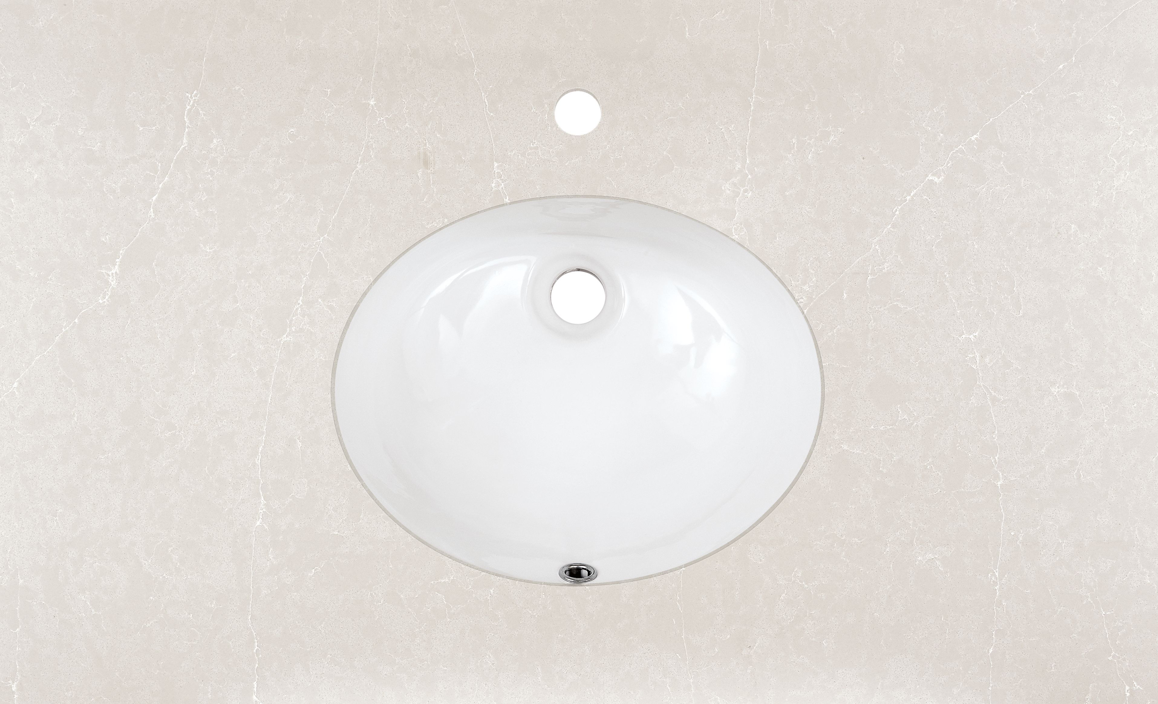 Top down detail of Vanity top in light grey quartz with oval sink and one facet holes.