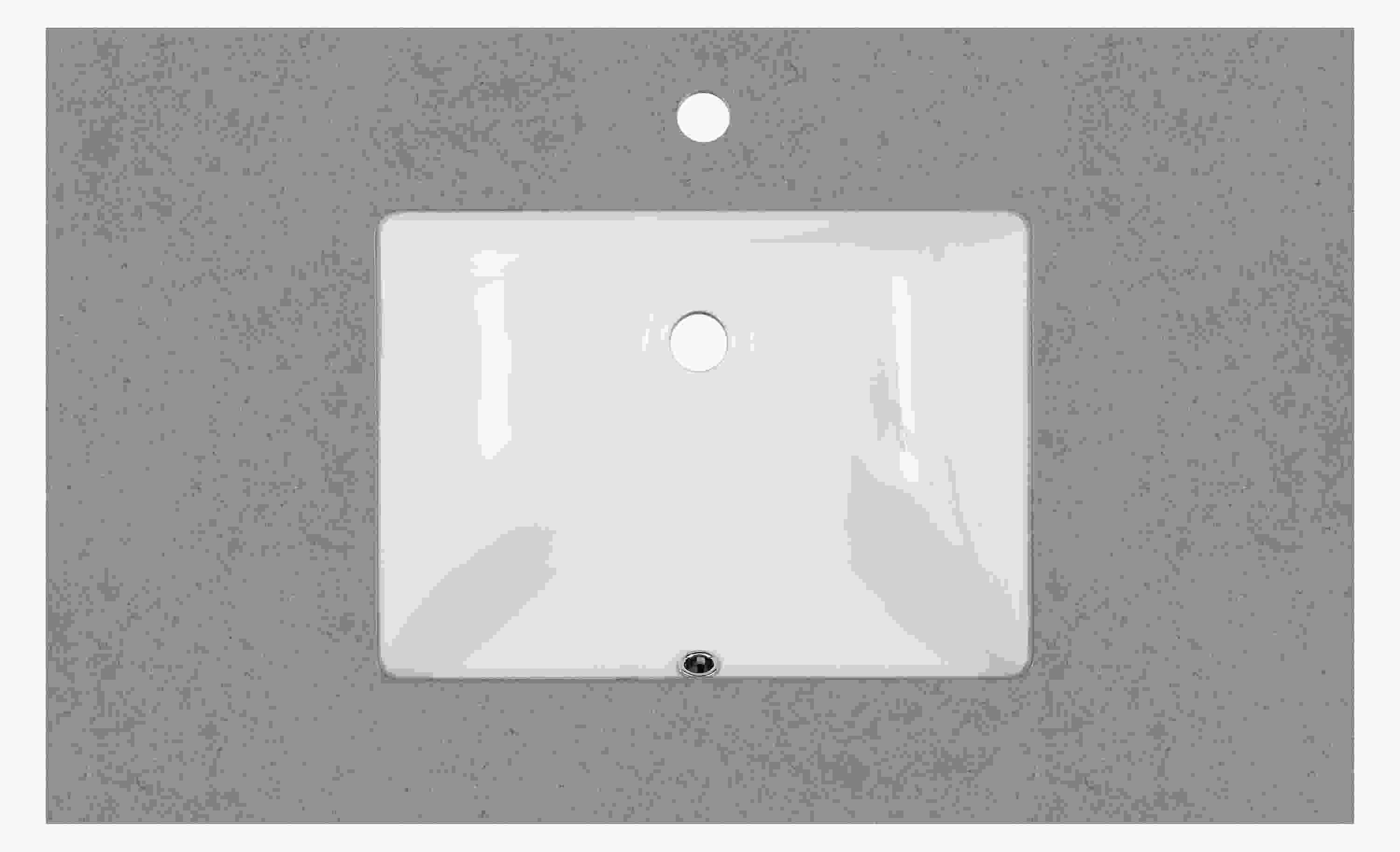 Top down detail of Vanity top in fog quartz quartz with rectangle sink one facet hole.