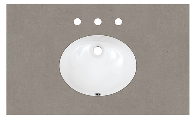 Top down detail of Vanity top in fog quartz with oval sink and three facet holes.