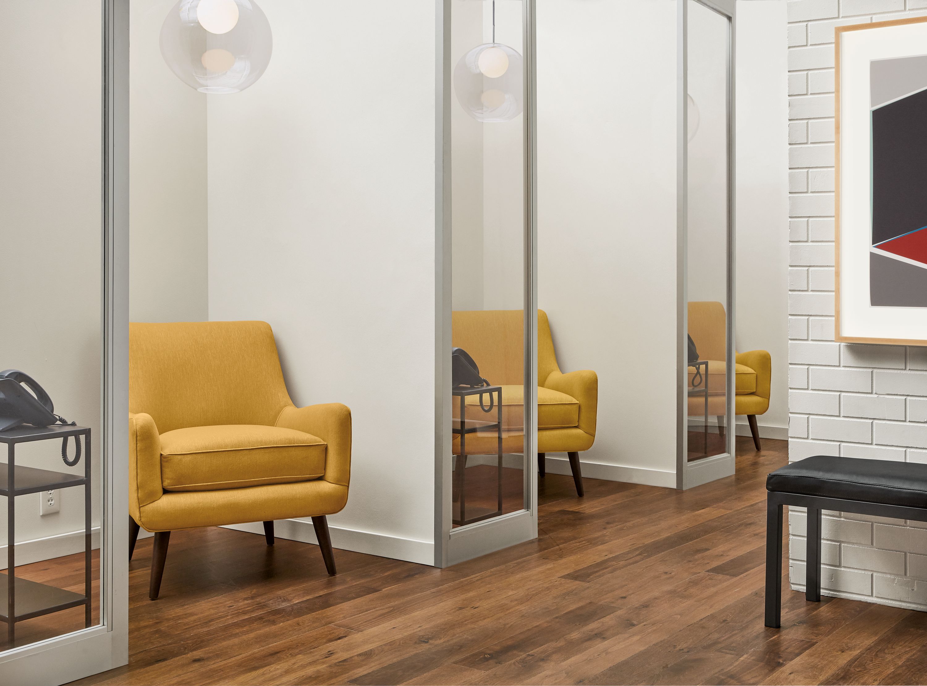 Detail of Quinn chairs in gold.