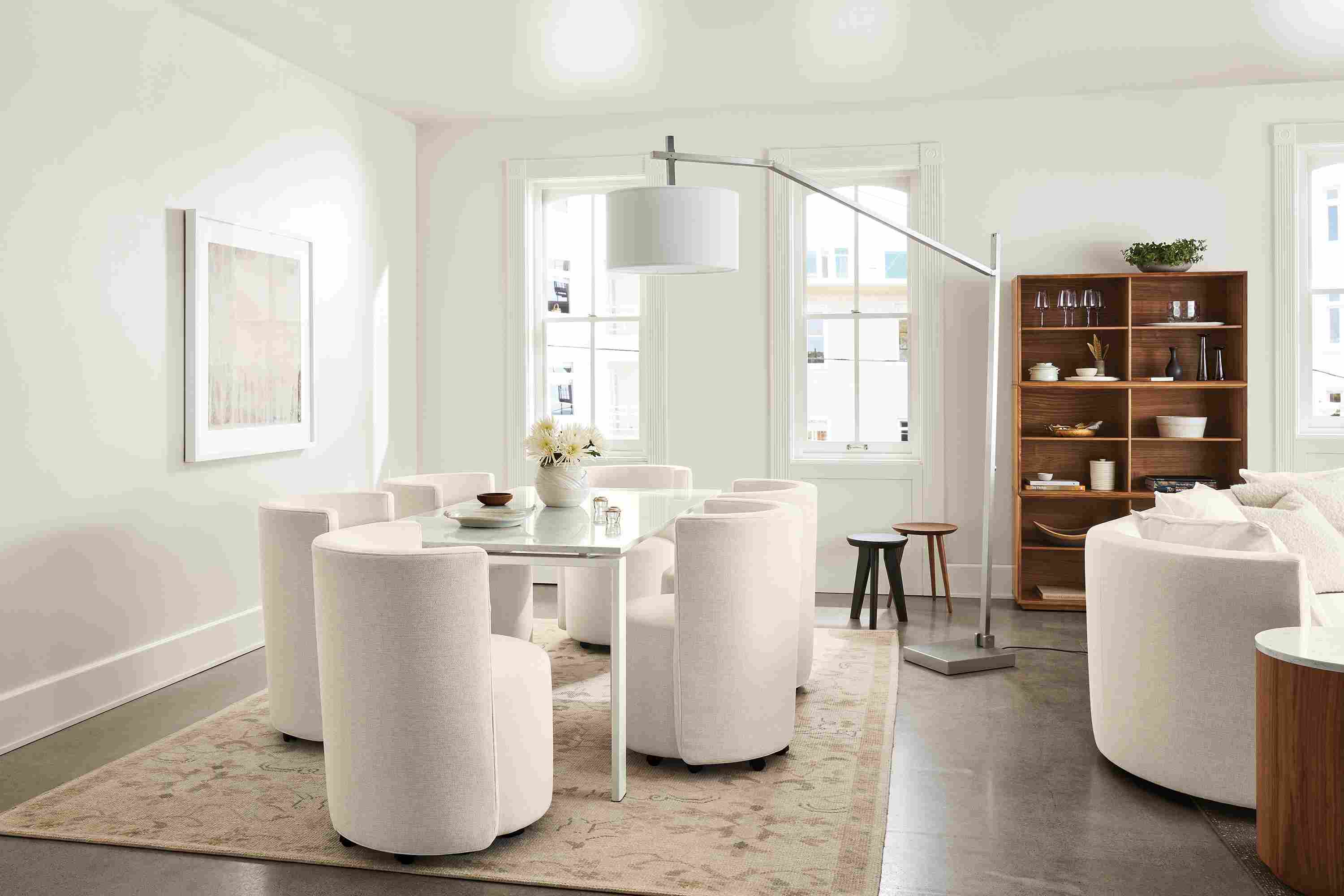 Dining room setting with Rand 72-wide Table, Como Dining Chair in Sumner Ivory and Ophelia Rug in Pumice.