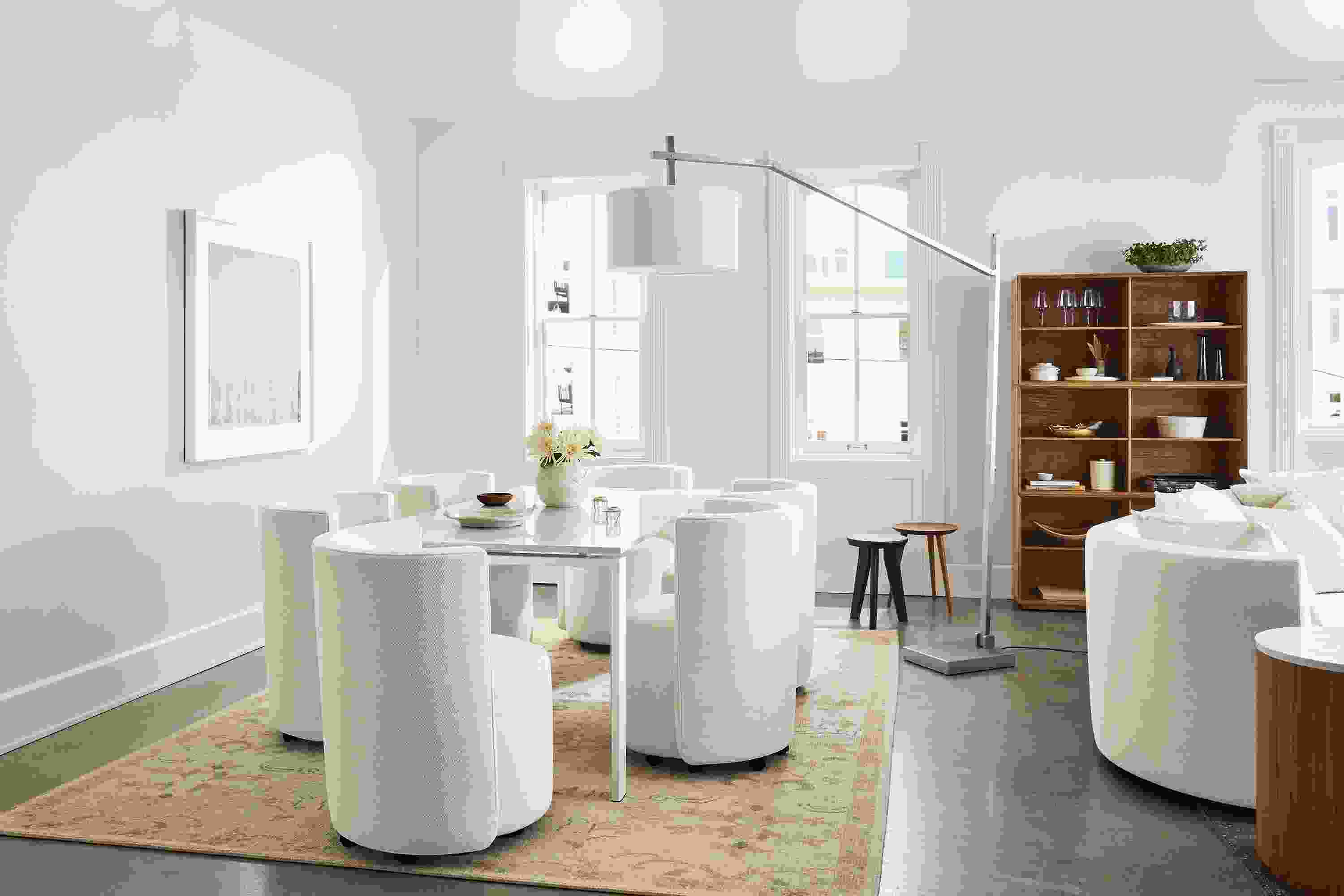Dining room setting with Rand 72-wide Table, Como Dining Chair in Sumner Ivory and Ophelia Rug in Pumice.