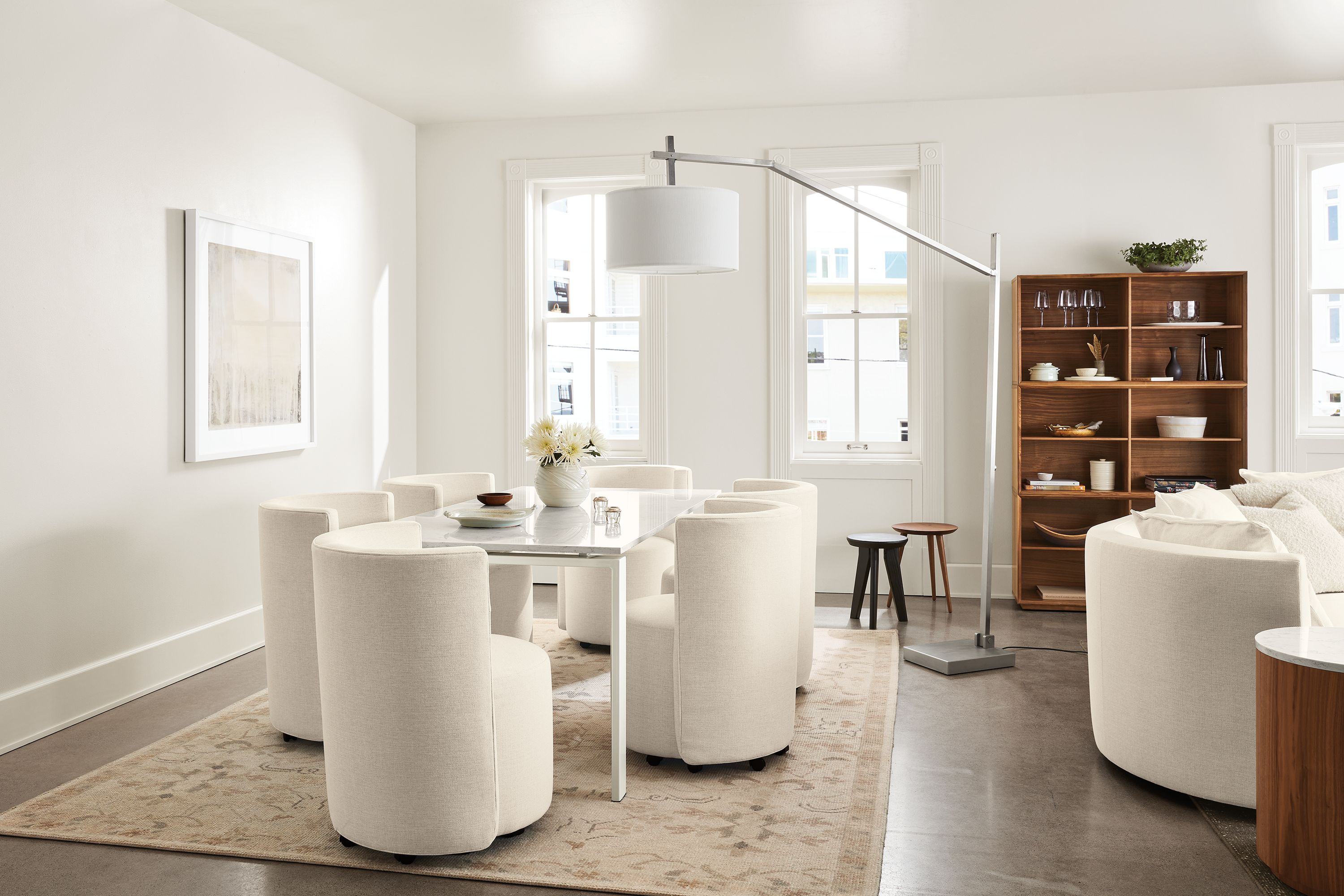 Dining room setting with Rand 72-wide Table, Como Dining Chair in Sumner Ivory and Ophelia Rug in Pumice.
