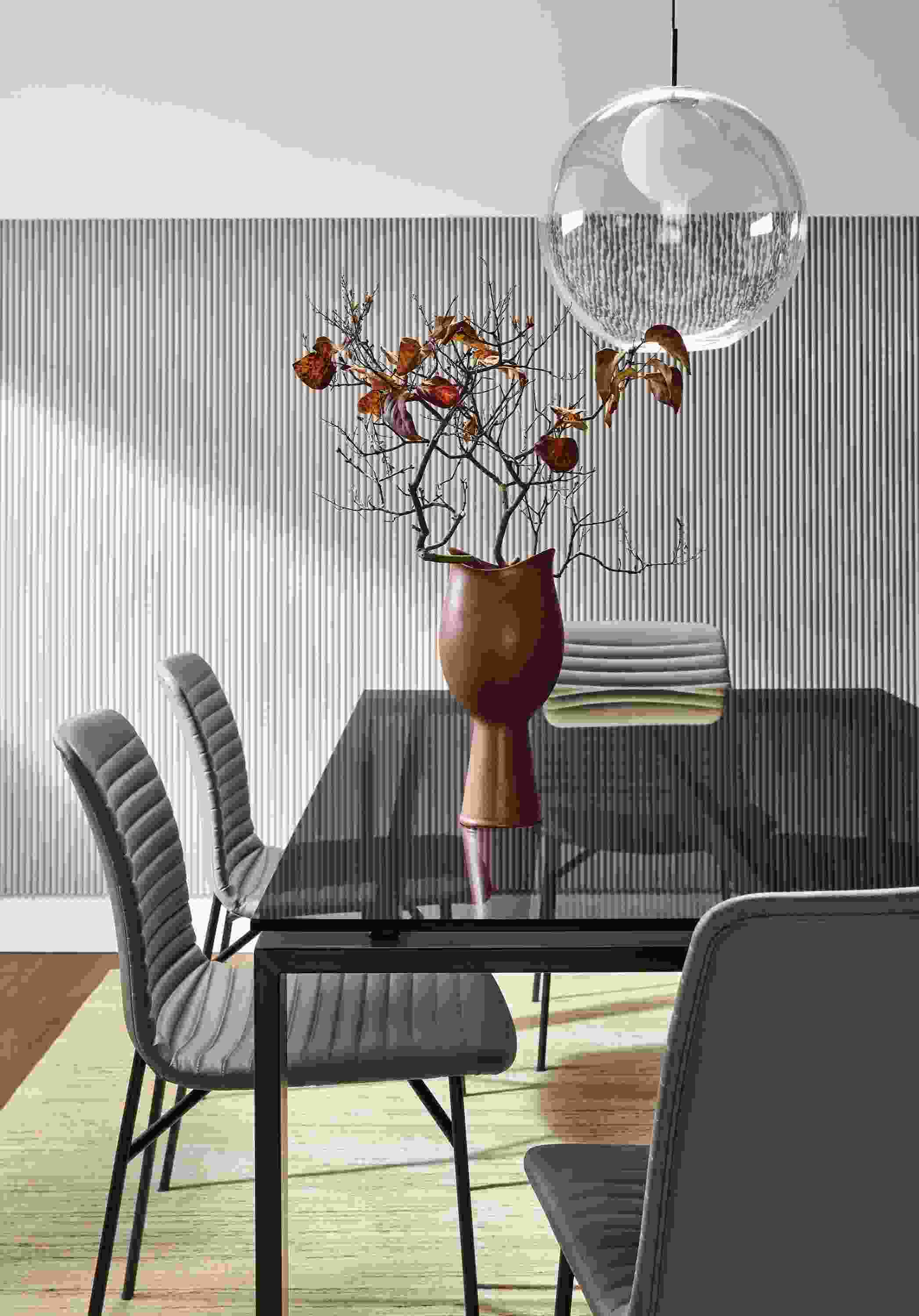 Dining room with Rand 78-wide table with Cato side table in putty Sarno leather.