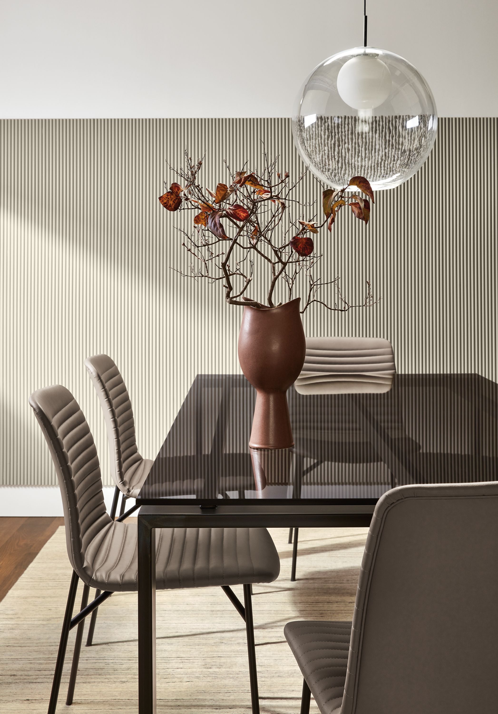 Dining room with Rand 78-wide table with Cato side table in putty Sarno leather.