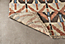 Detail of Rava 5'x8' Rug in Brick.