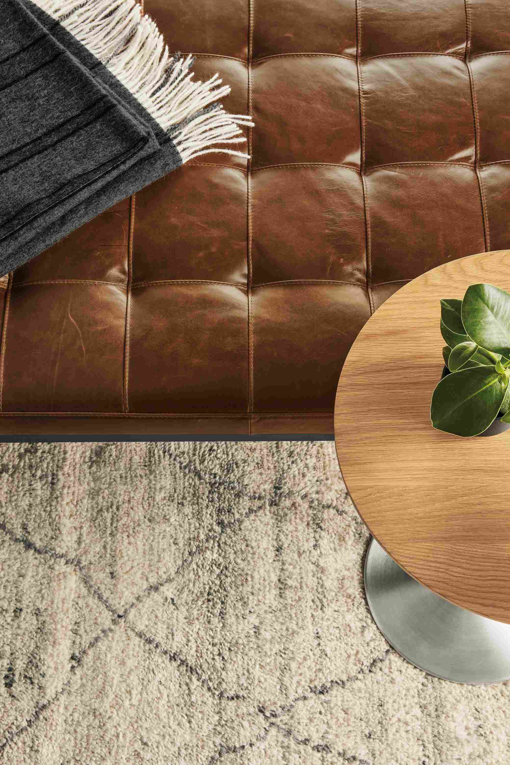 Detail of Ravella daybed in Vento Cognac leather.