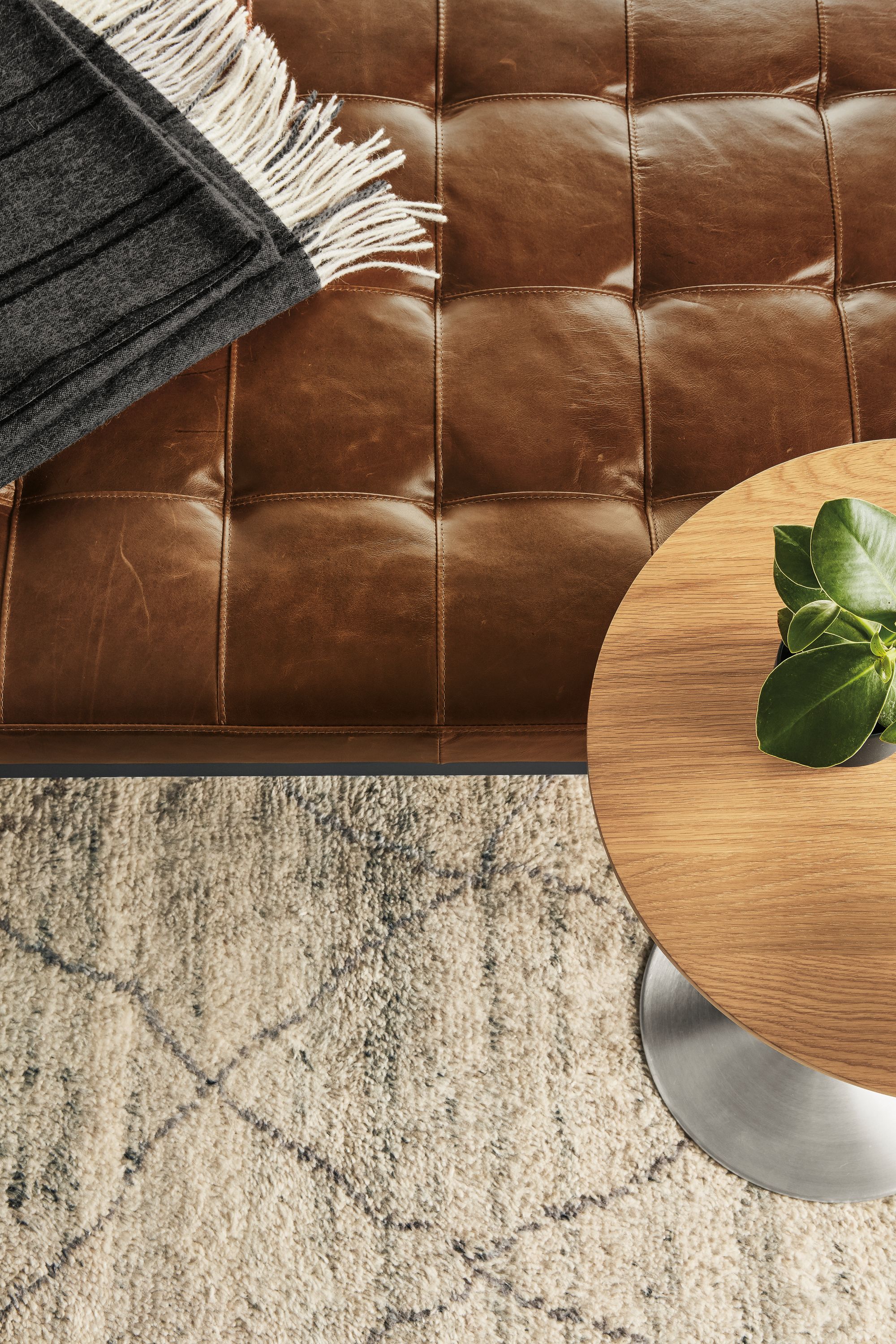 Detail of Ravella daybed in Vento Cognac leather.
