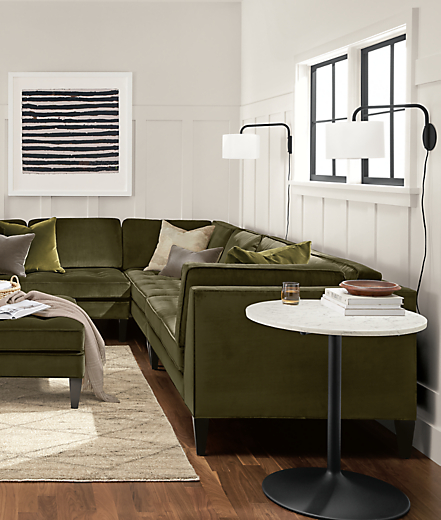 Living room with Hutton 140-by-110 three-piece sectional in vance olive.