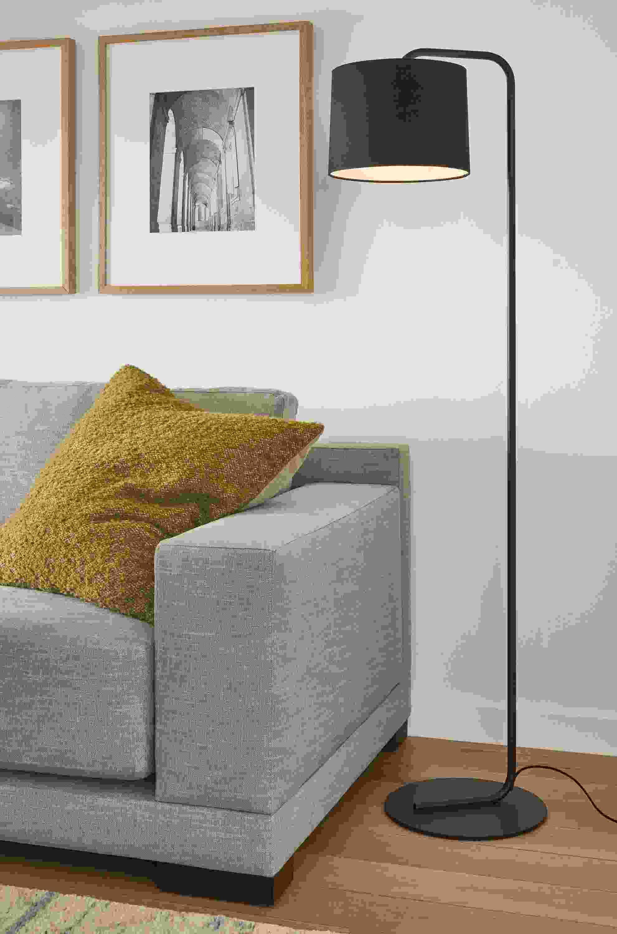Room setting with Rayne 58-high floor lamp in black and Mira sofa in Destin Putty.