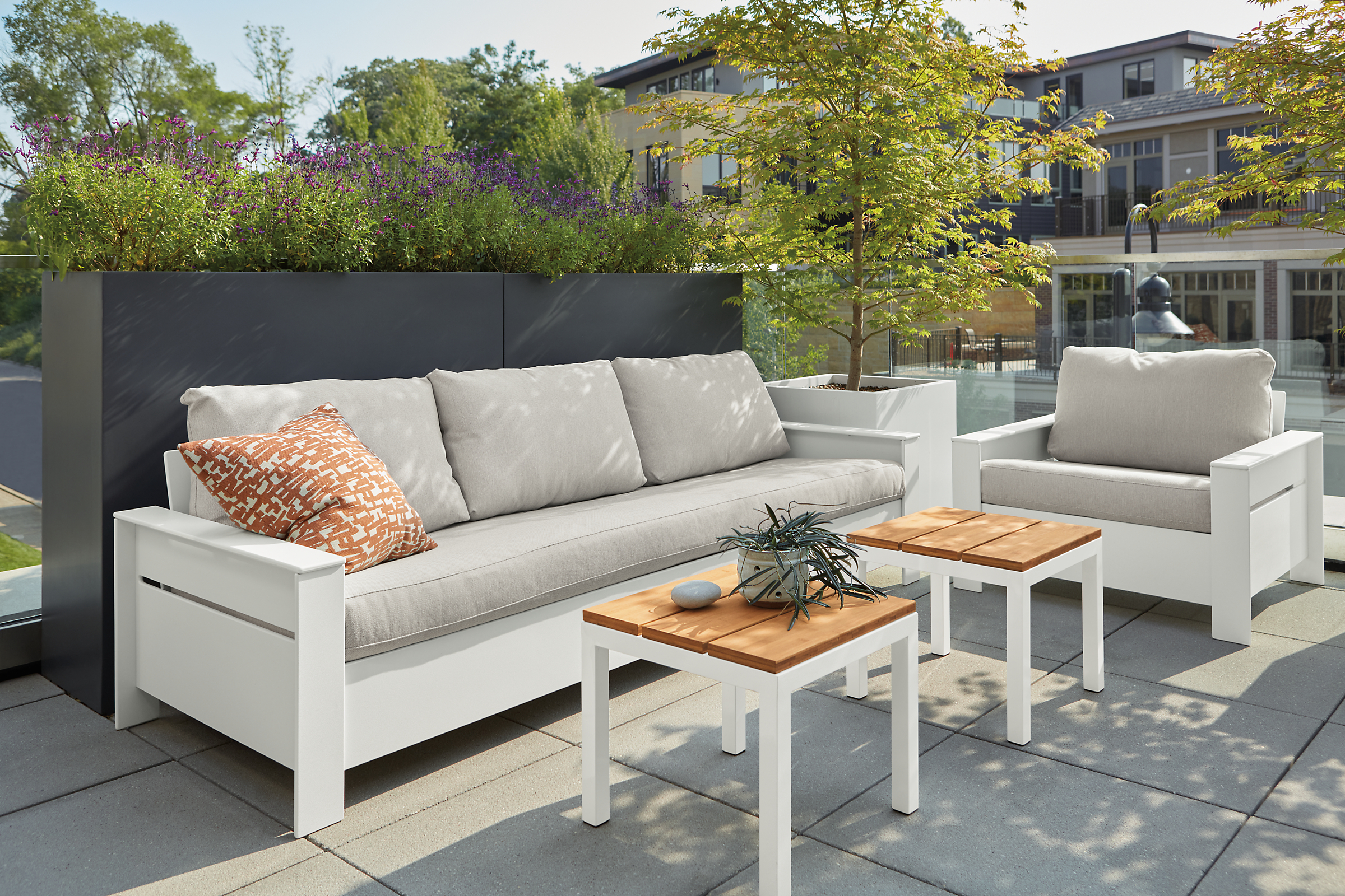Outdoor setting with Rayo 92-wide sofa in Mist fabric with Rayo lounge chair.