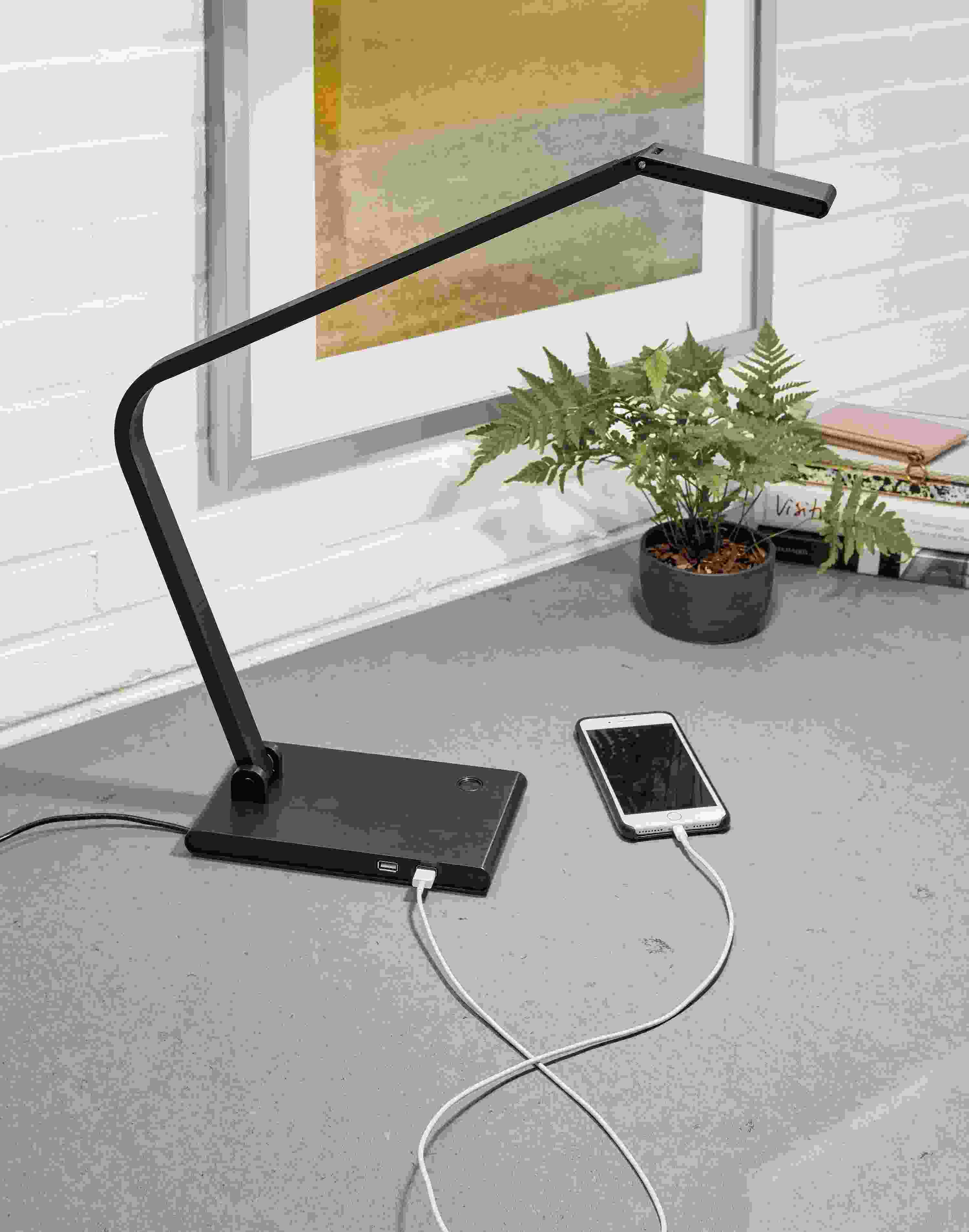 Detail of Reach table lamp in anodized black.