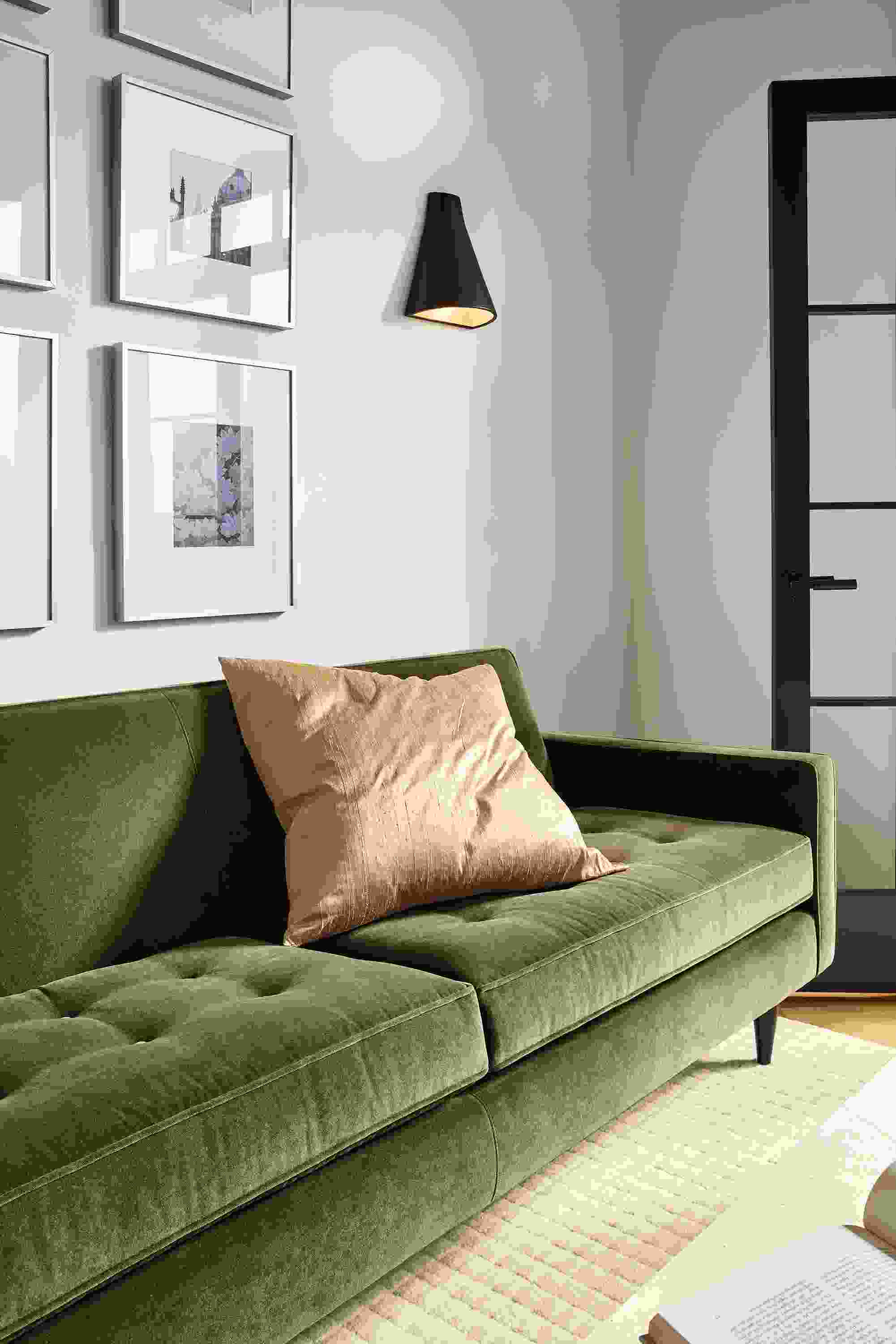 living room with reese sofa in banks fir velvet, with velvet pillow.