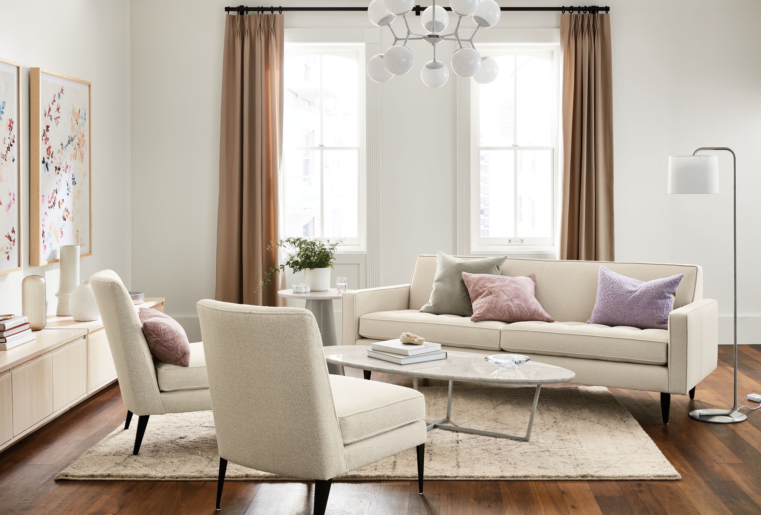 Living room with Reese 85-inch sofa and nadine chair in banks denim.