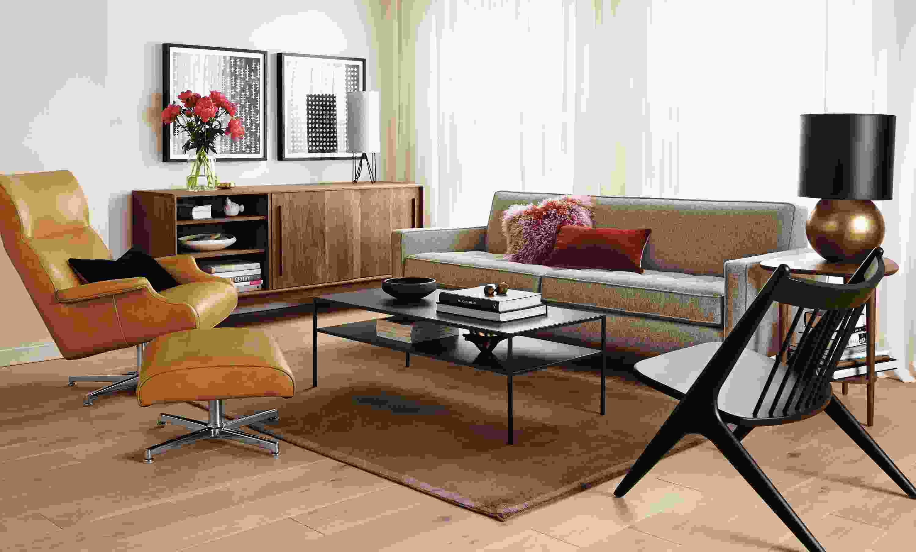 Living room with Reese sofa in Tatum Grey and Slim Coffee table in natural steel.