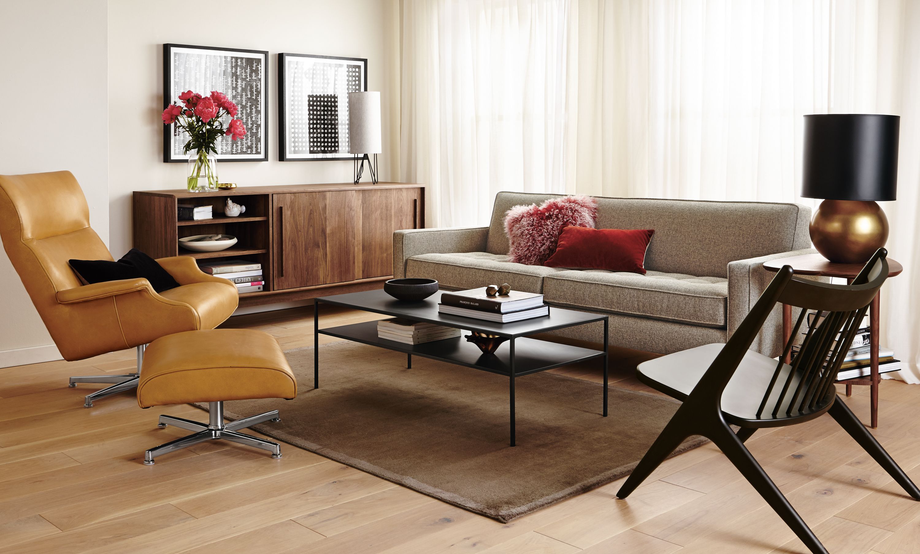 Living room with Reese sofa in Tatum Grey and Slim Coffee table in natural steel.