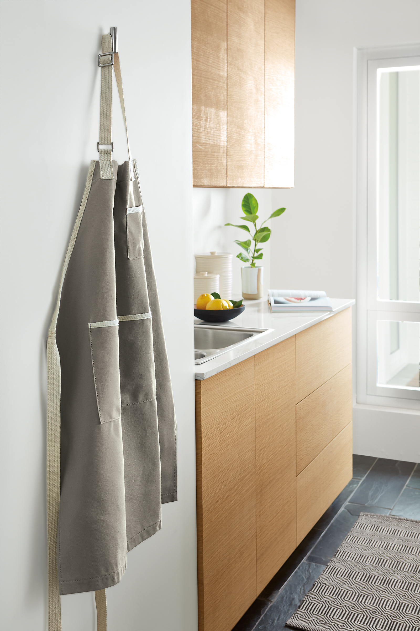 Kitchen image with renzo apron on pier wall hook.