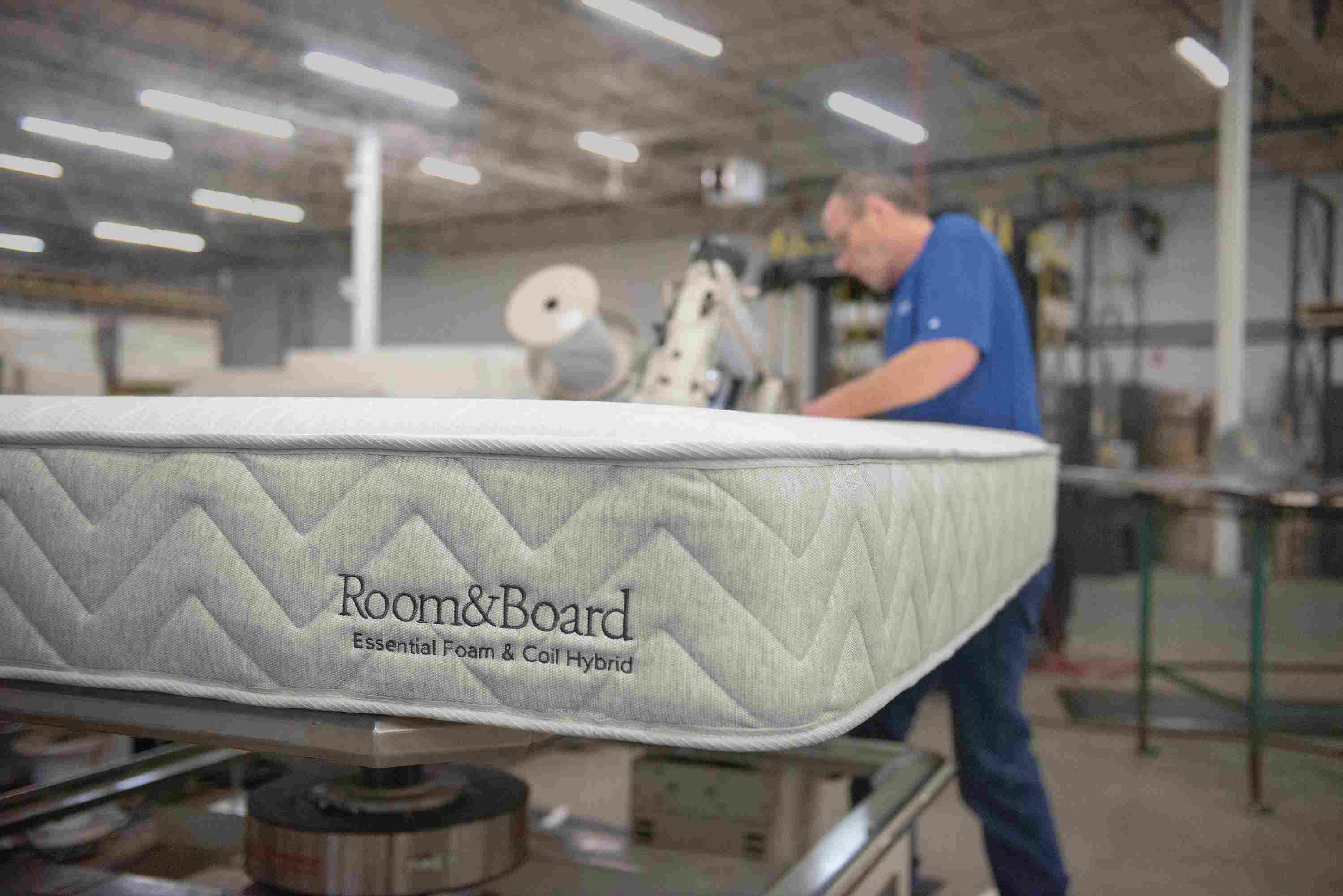 Detail of a completed mattress showing Room & Board logo in the Restwell mattress facility.