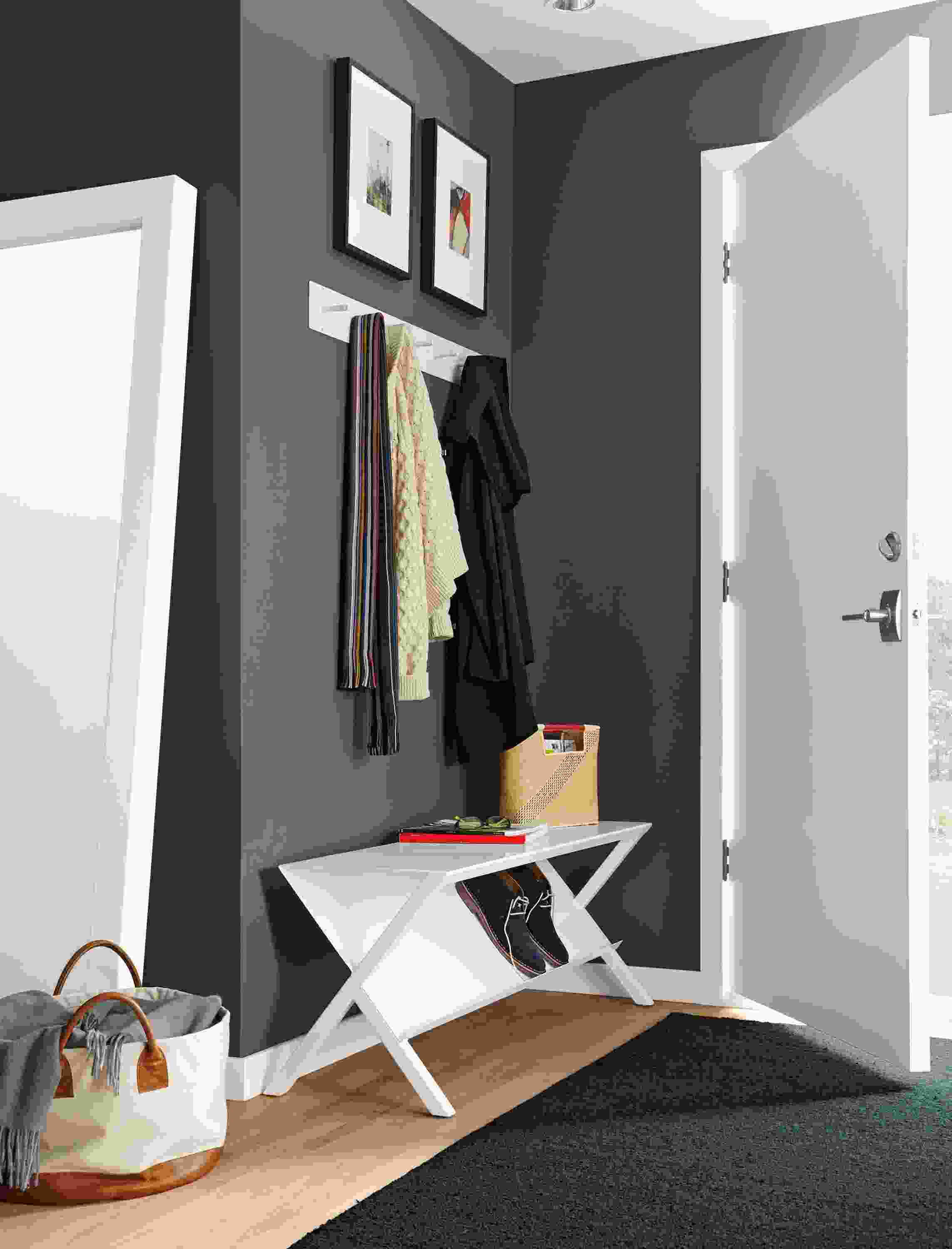 Entryway with detail of Rex bench in white.