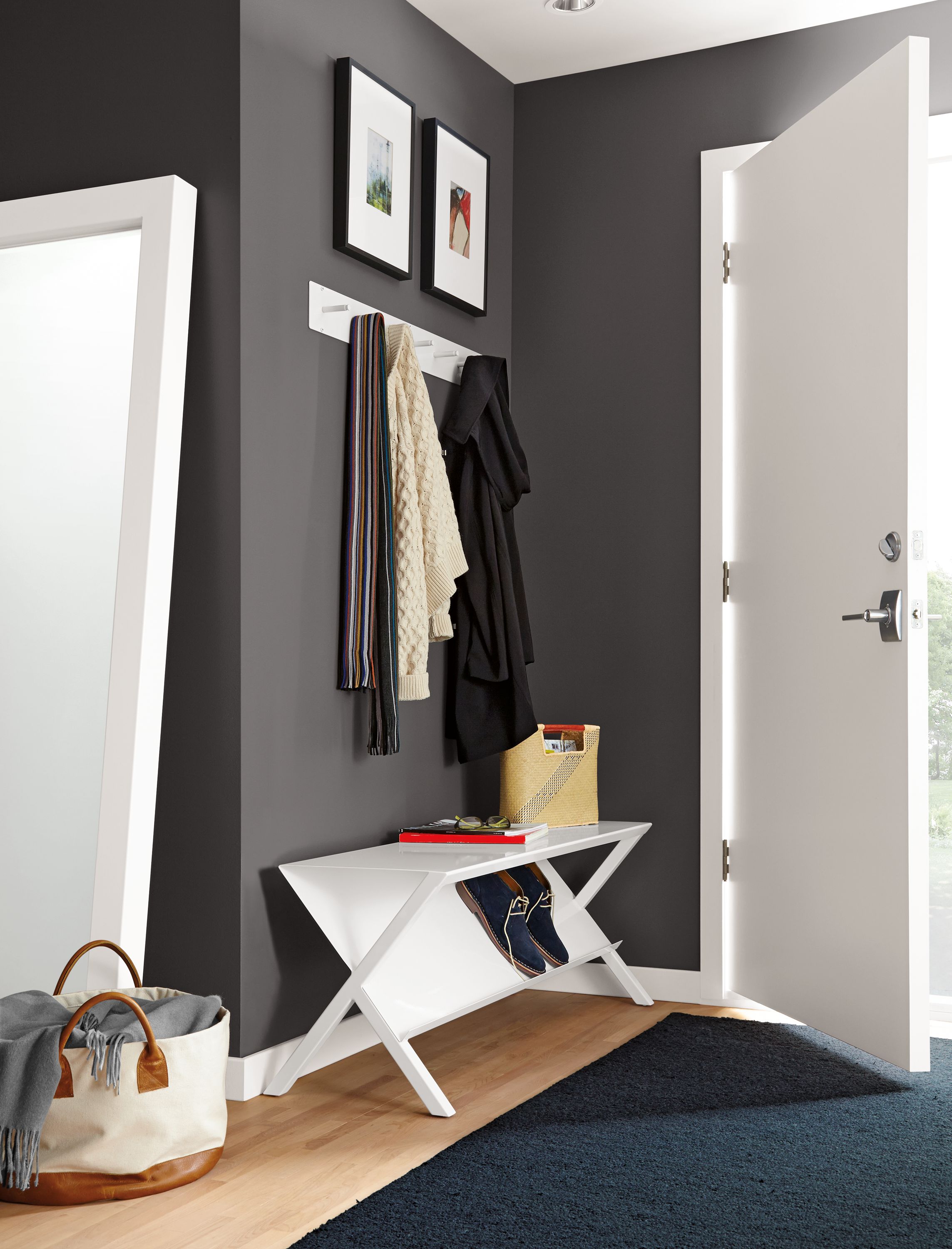 Entryway with detail of Rex bench in white.