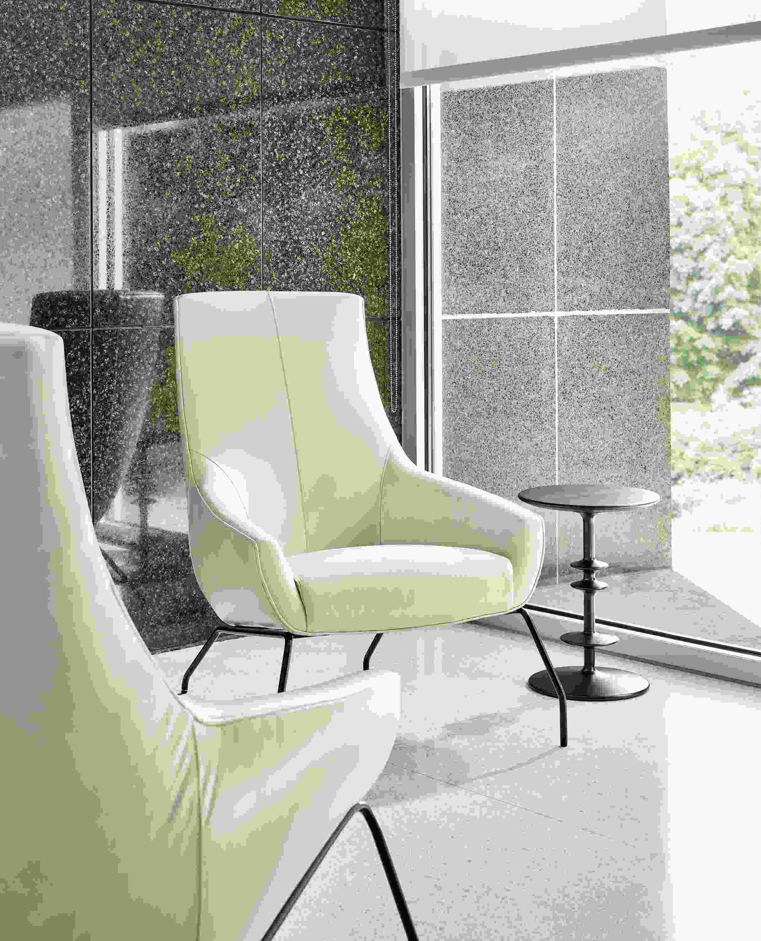 Rhodes lounge chair in Vento vory with parks end table in charcoal on cherry.