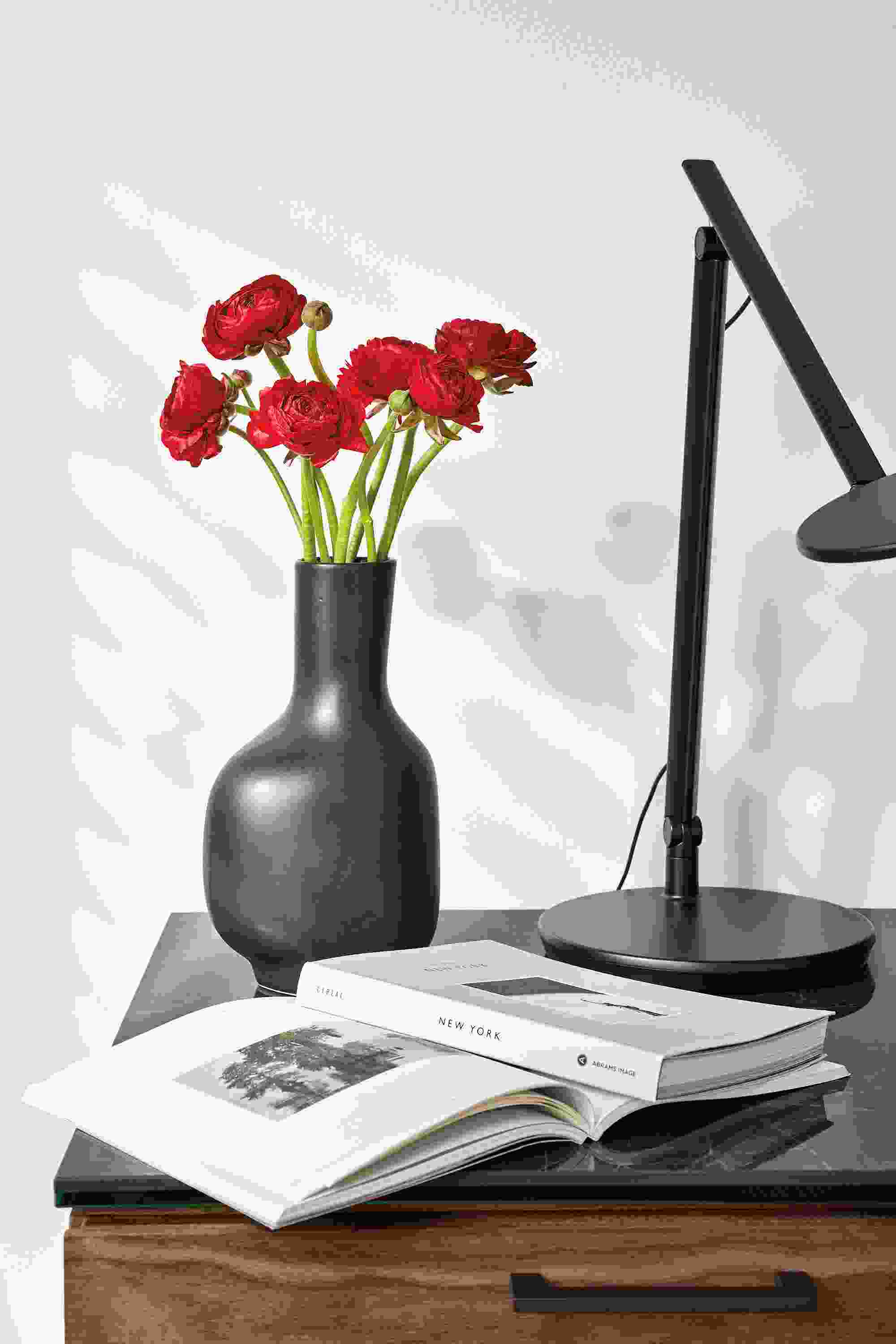 Detail of ripple vase in black on a Kenwood 2-drawer nightstand.