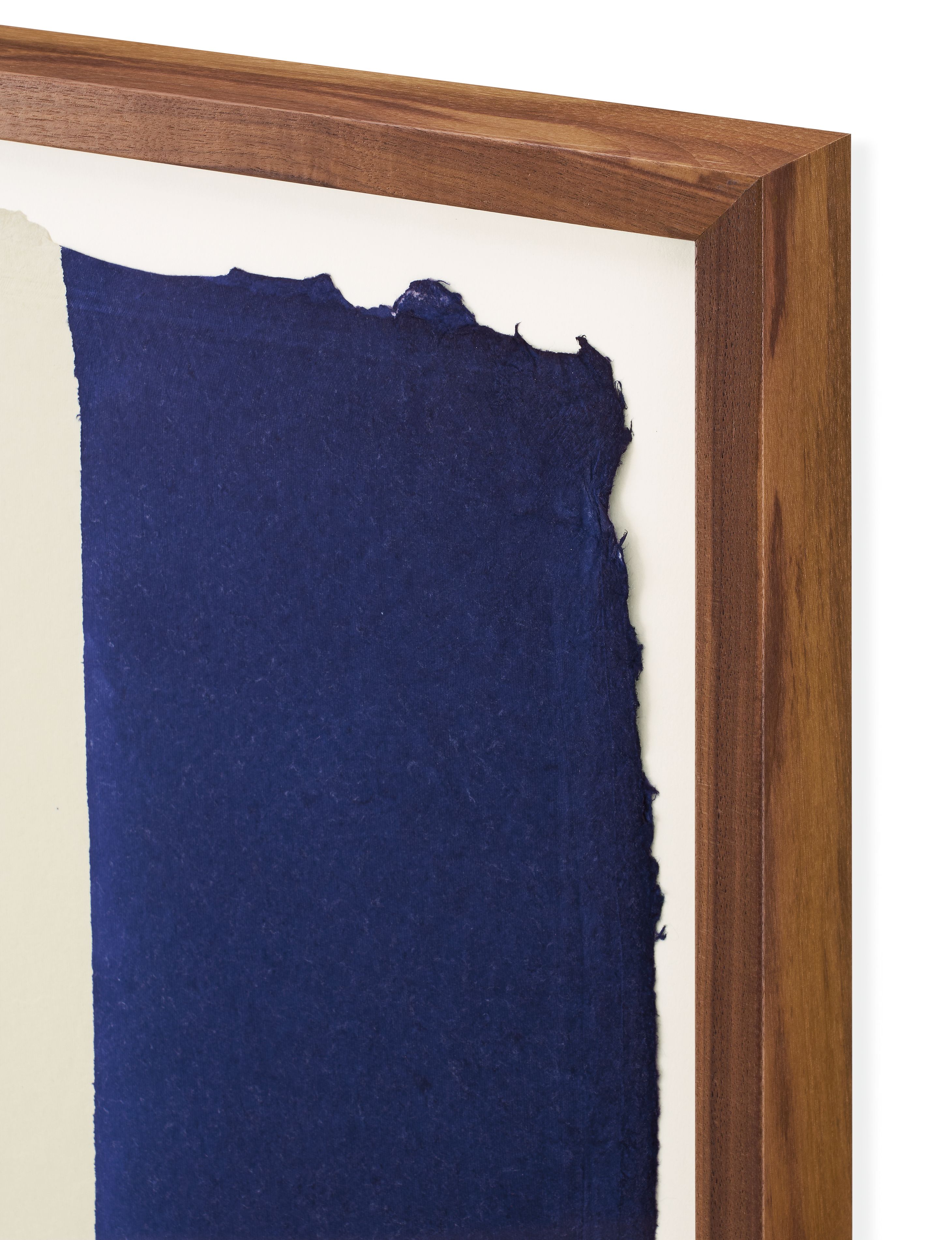 Corner detail of walnut frame on artwork Dip Dye #1 Indigo from John Robshaw.