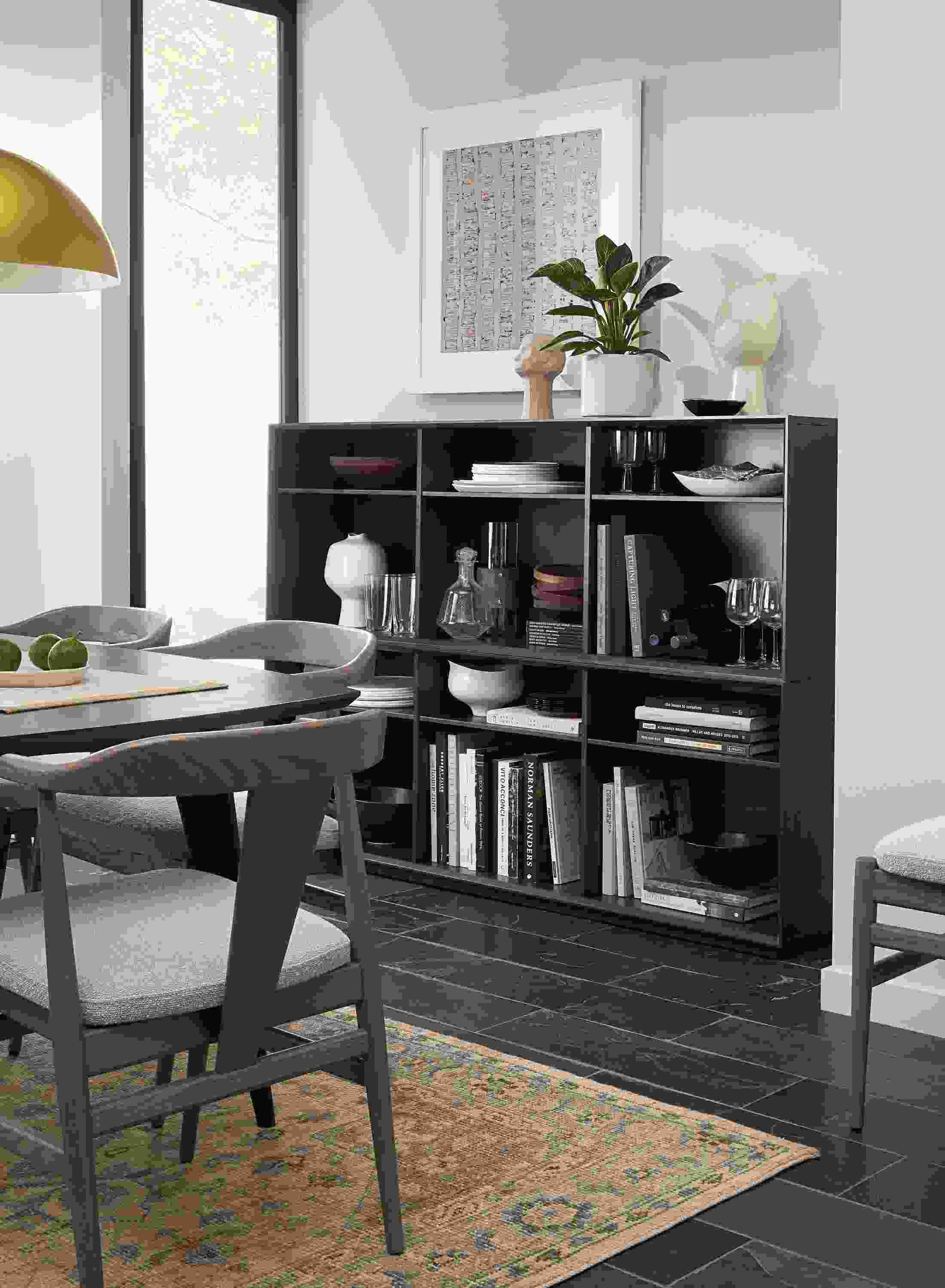 Dining room with Rollins stacking cubes in charcoal on maple and Veda rug in camel.