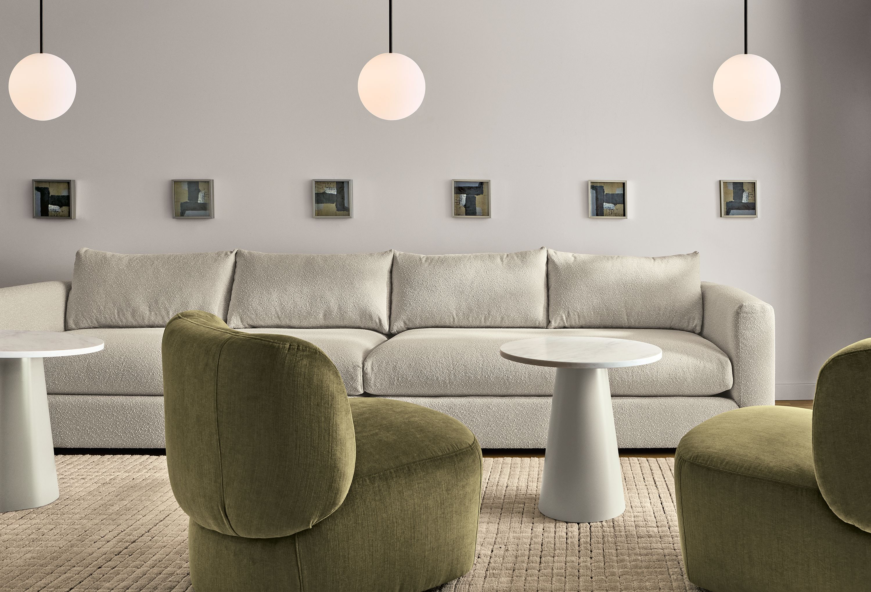 Living room with 2 rory swivel chairs in windsor olive and 2 hannah sofas in declan natural.