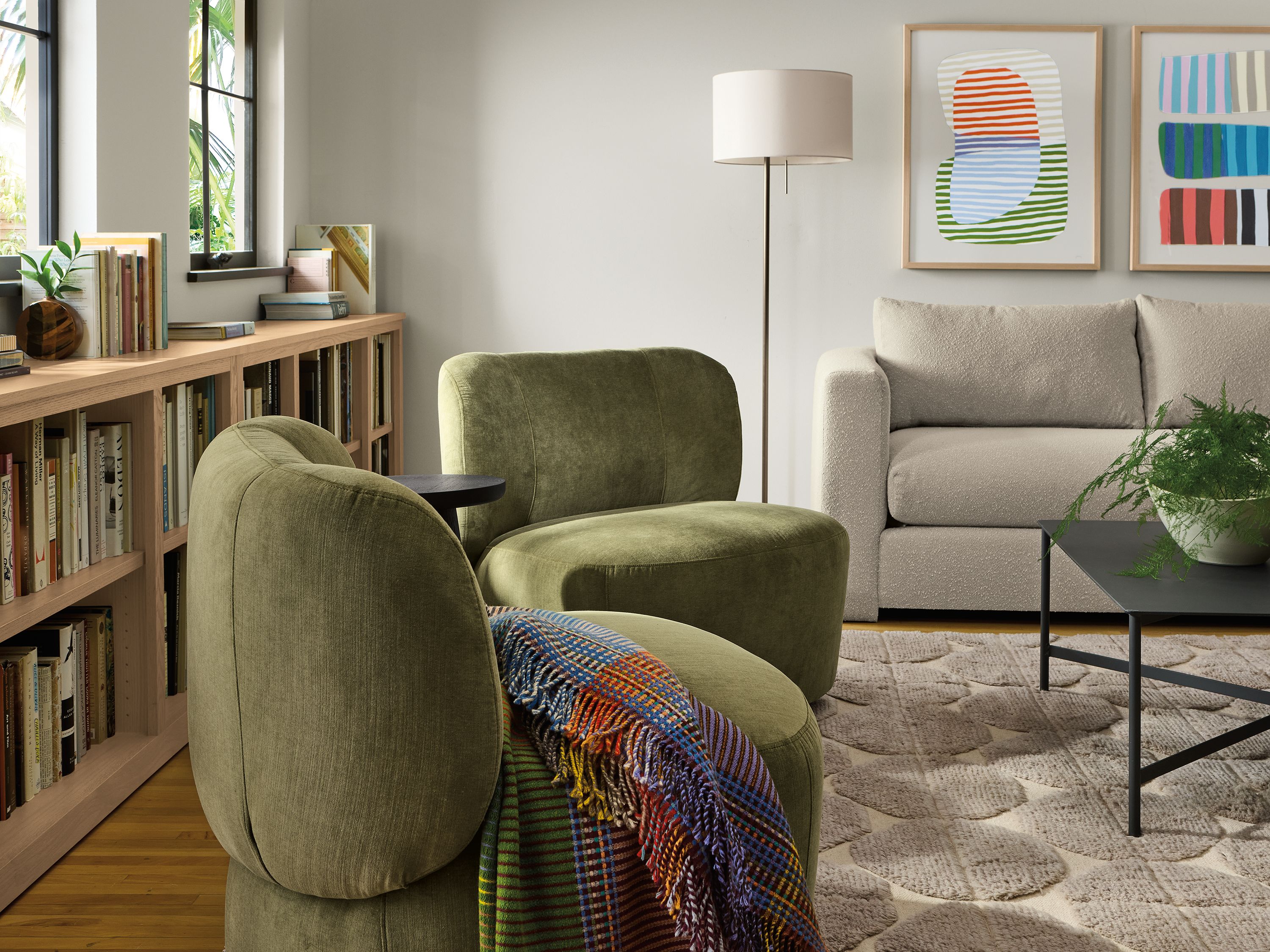 Living room with 2 Rory swivel chairs in windsor olive, Hannah sofa in Declan Natural and circuit coffee table.