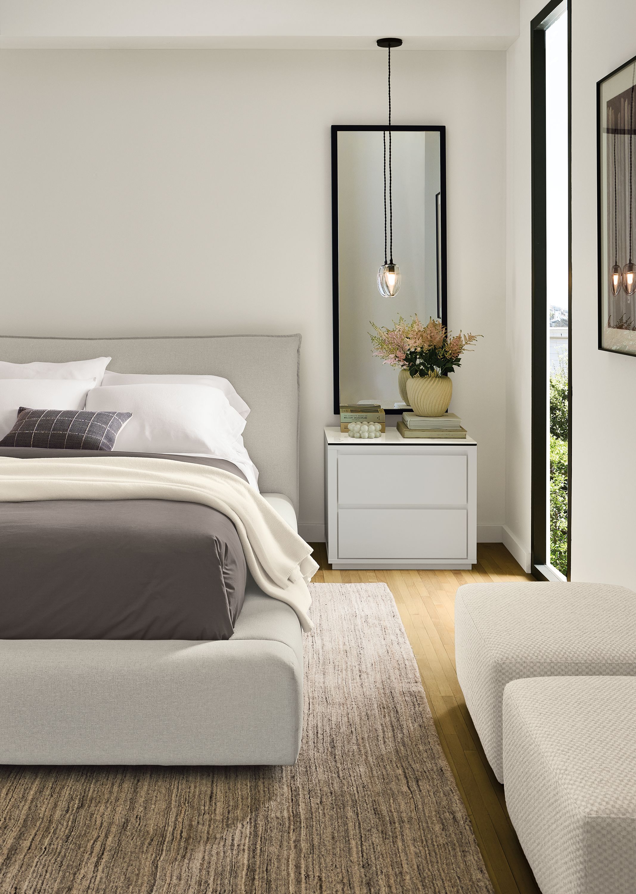Rue queen storage bed in Myers Oatmeal, Arro 2-drawer nightstand in white with marbled white ceramic top.