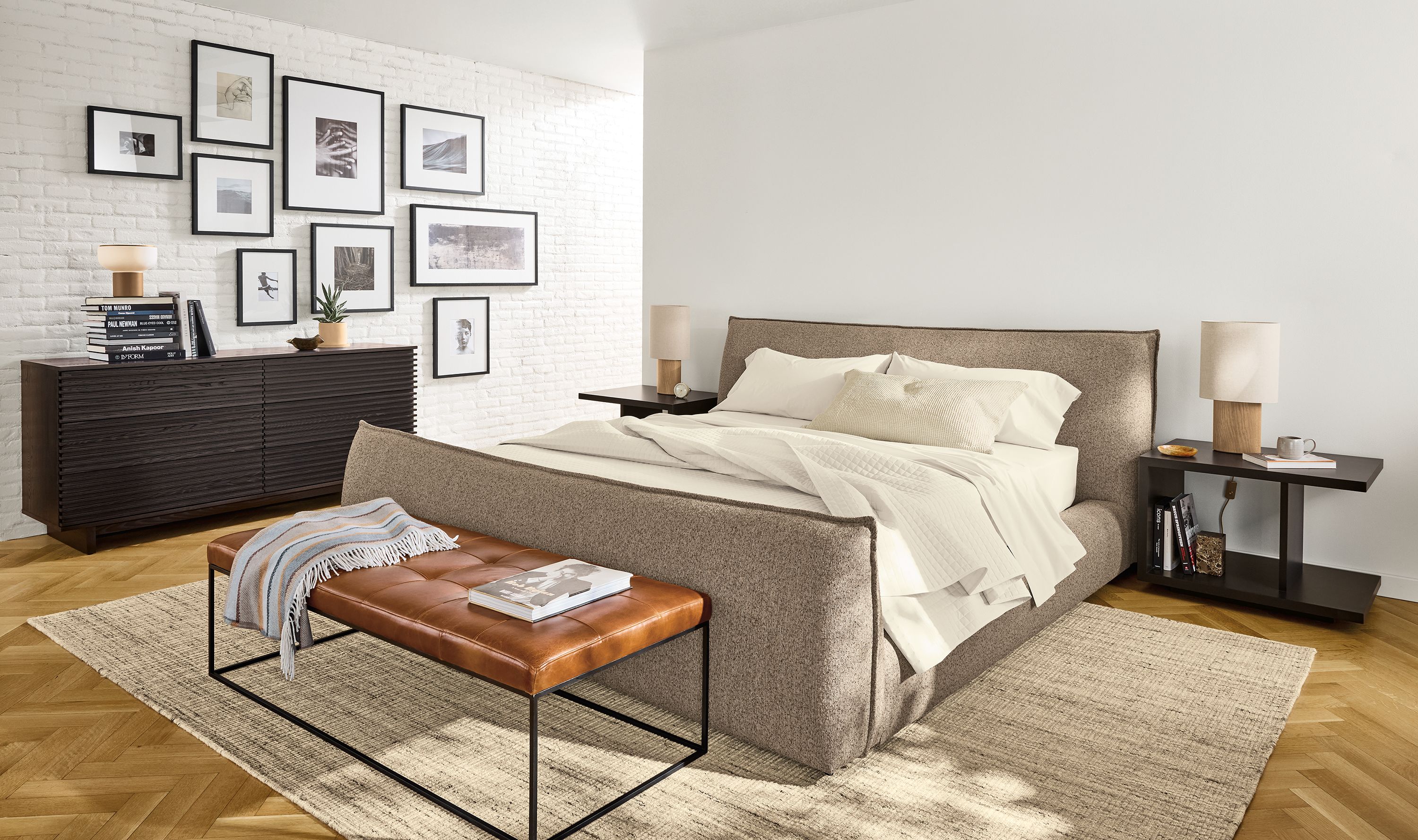 Bedroom with Rue king bed in conley mink, 2 Graham end tables in charcoal and Coles 6-drawer dresser in charcoal.