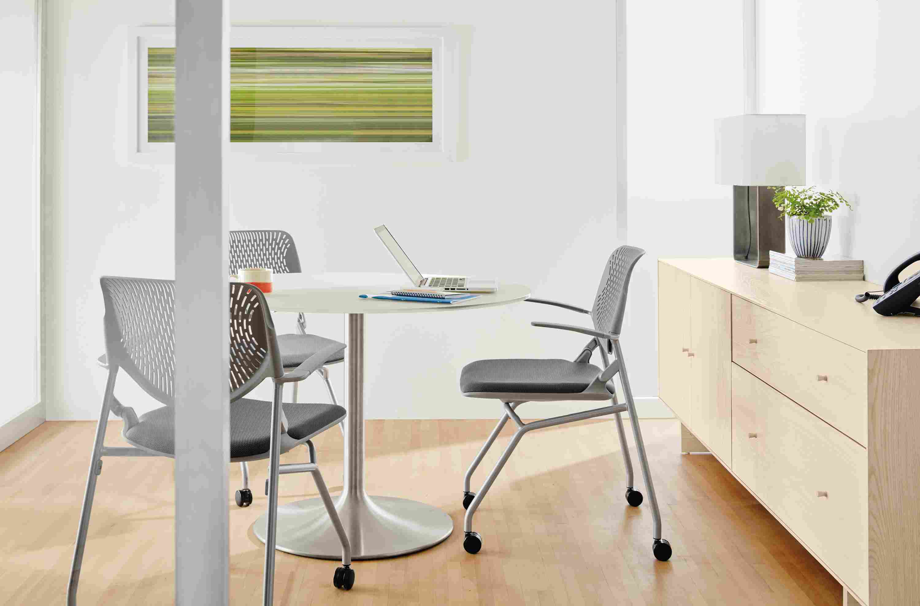 Detail of Runa nesting office chair in silver and grey.