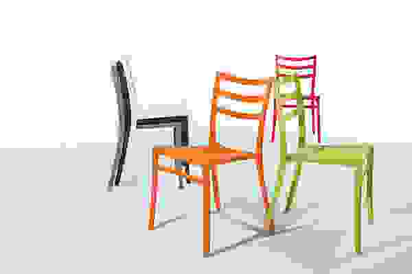 Sabrina chairs in orange, green, grey, dark grey, white and red.