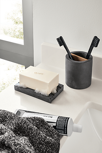 Detail of Saco toothbrush holder in charcoal.