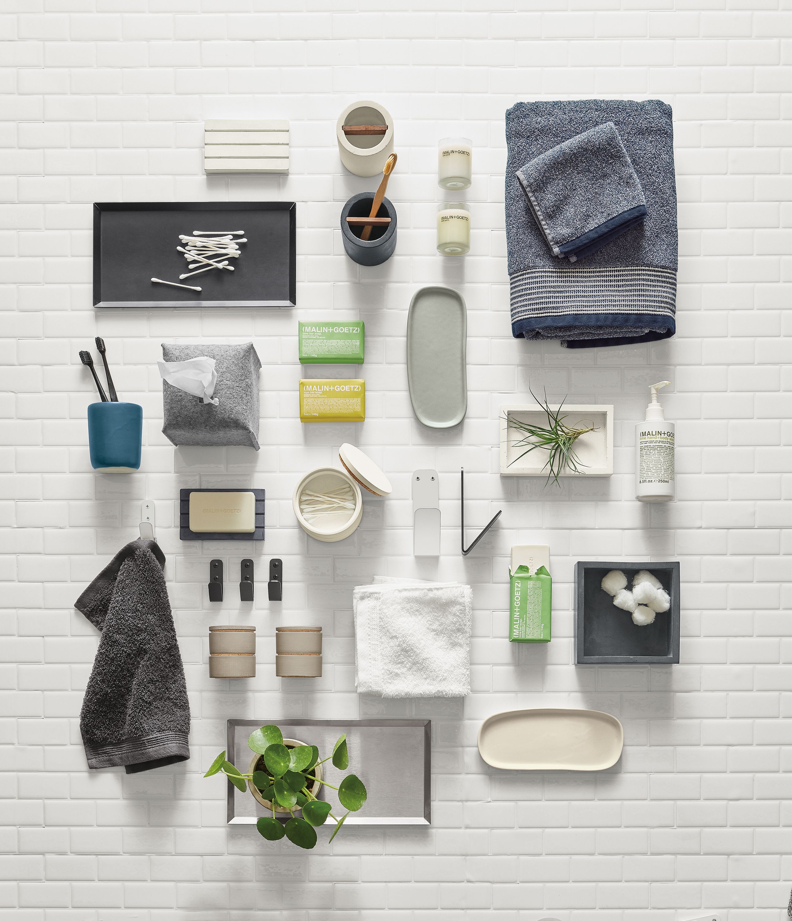 Collage of Room & Board bath accessories.