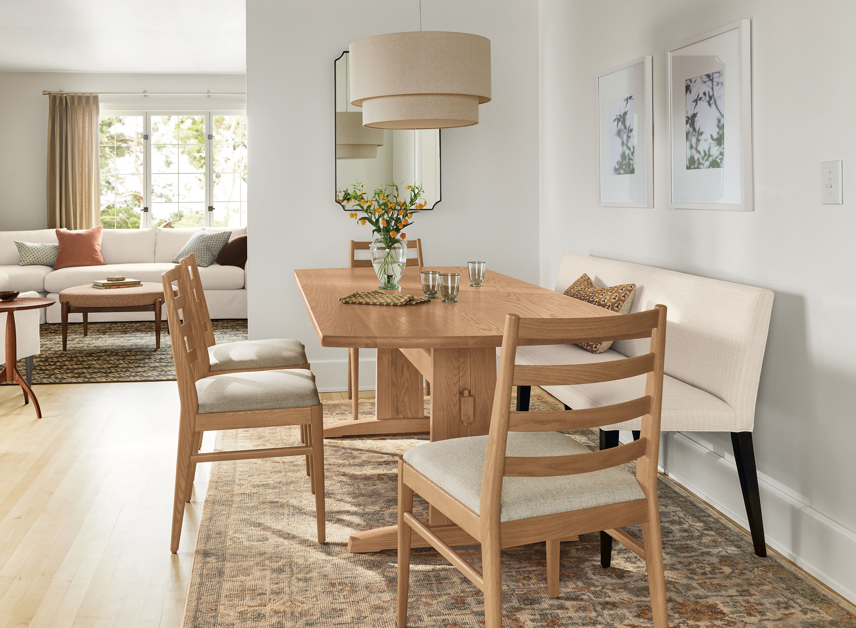 Dining room with Salem table and Conway chairs in rye on red oak and Ava banquette in prado natural.