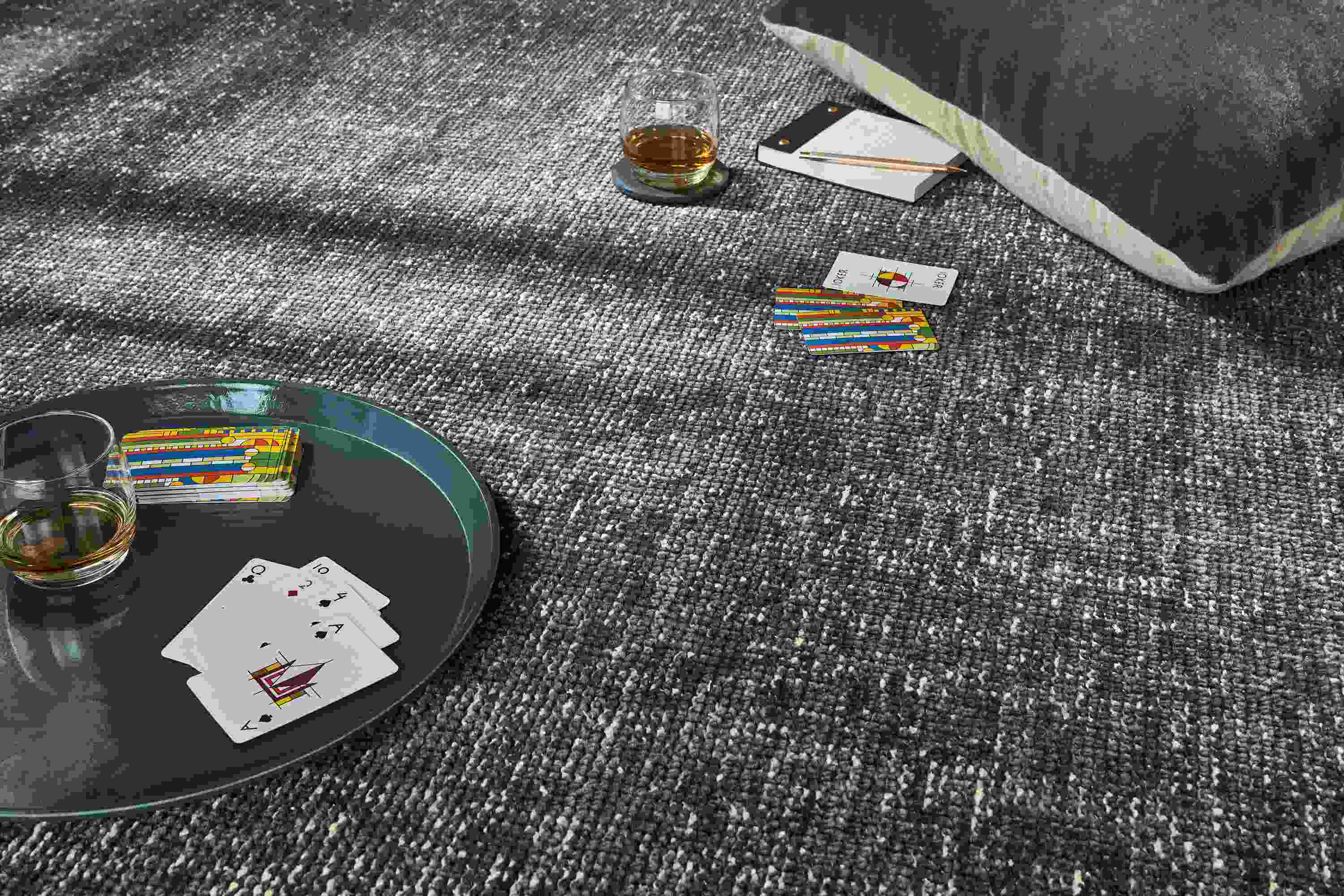 Detail of Samar rug in ink with Frank Lloyd Wright playing card set.