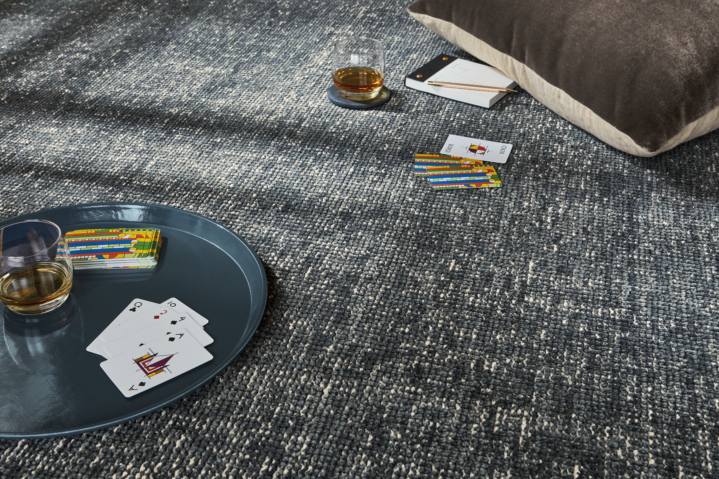 Detail of Samar rug in ink with Frank Lloyd Wright playing card set.