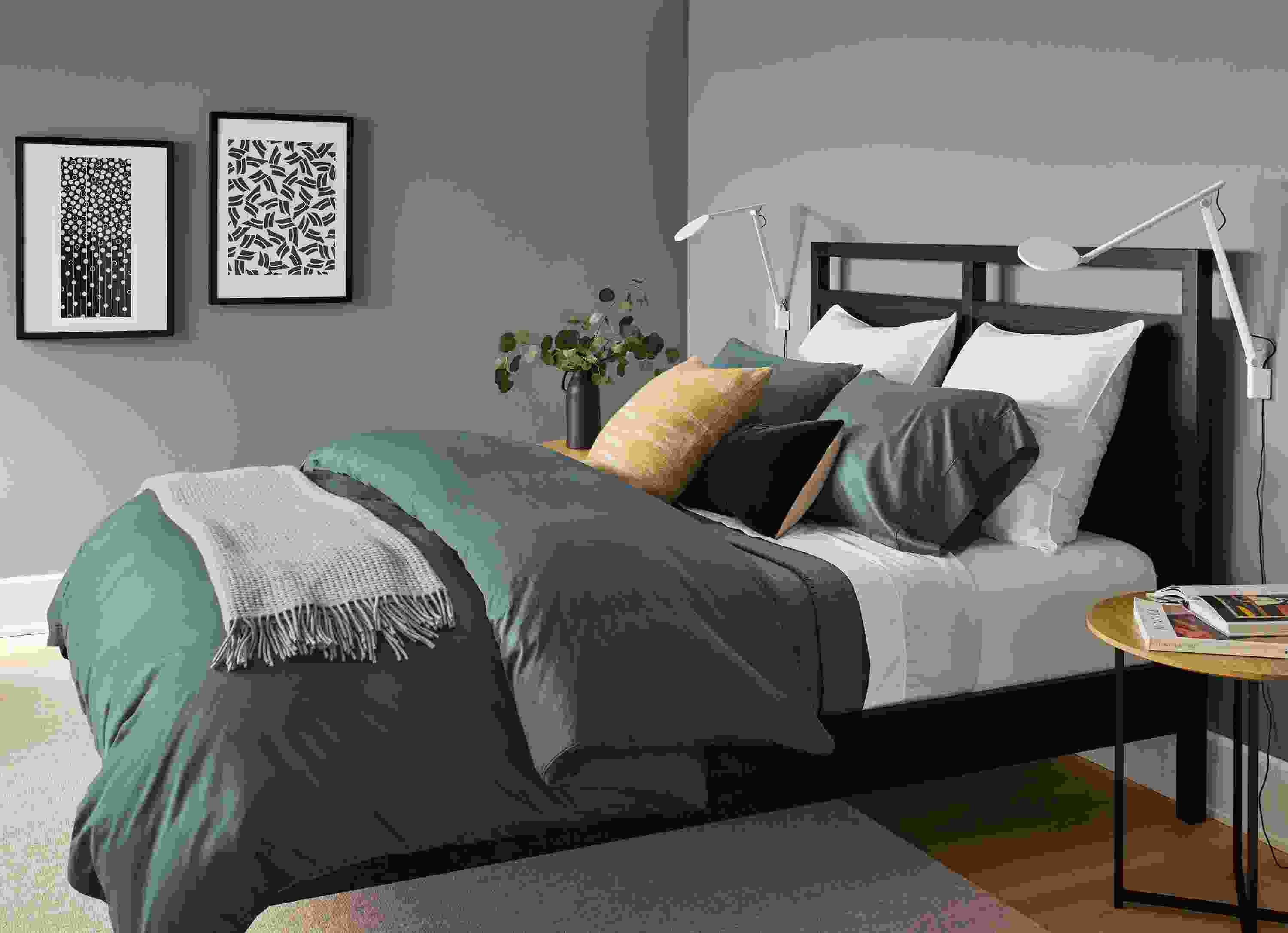 Bedroom setting with Tailored sateen duvet cover in dark slate with white sheets.
