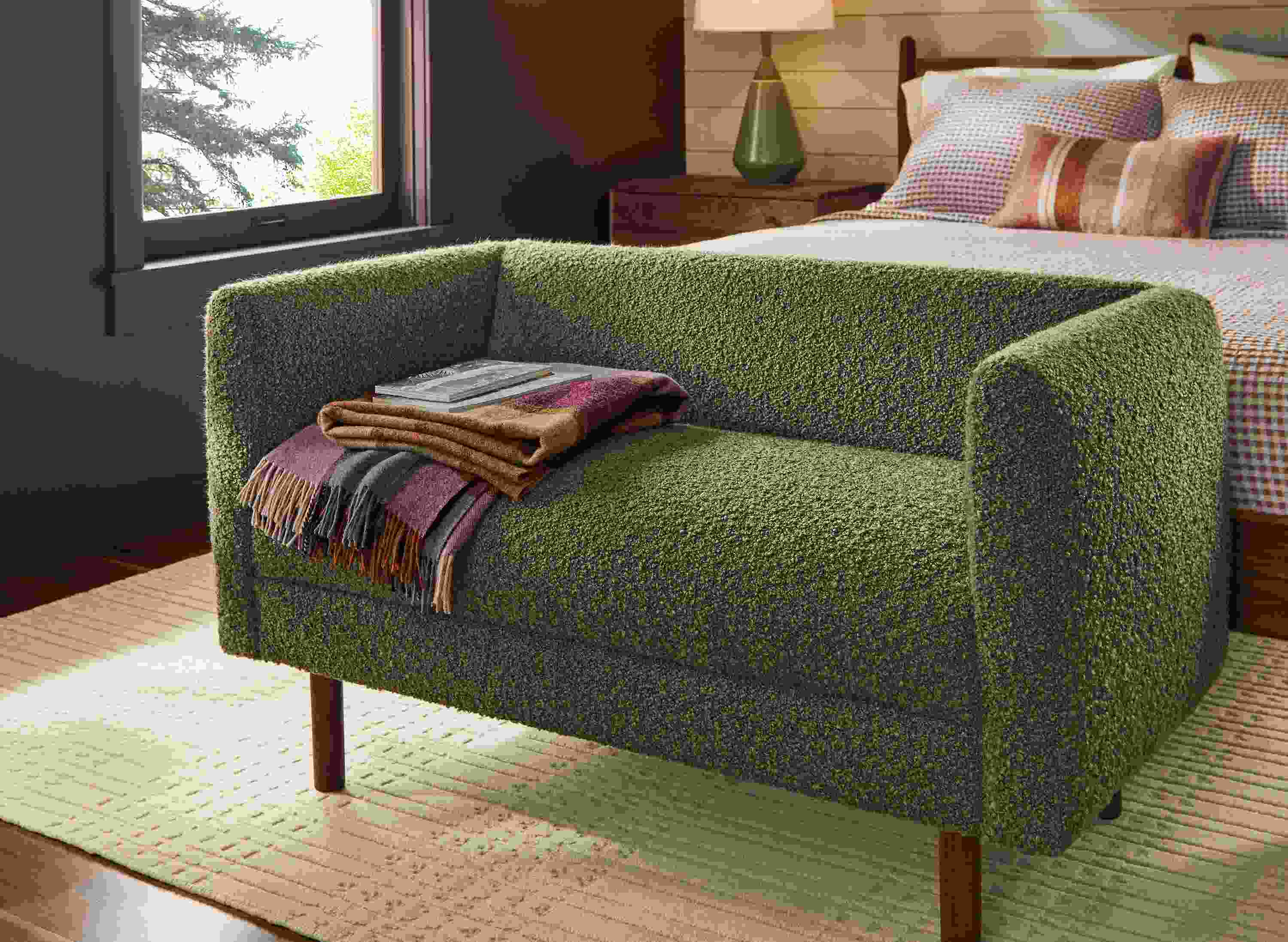 Bedroom with Satler 48-wide bench in Dornick Olive sitting at the end of a grove queen bed in walnut.