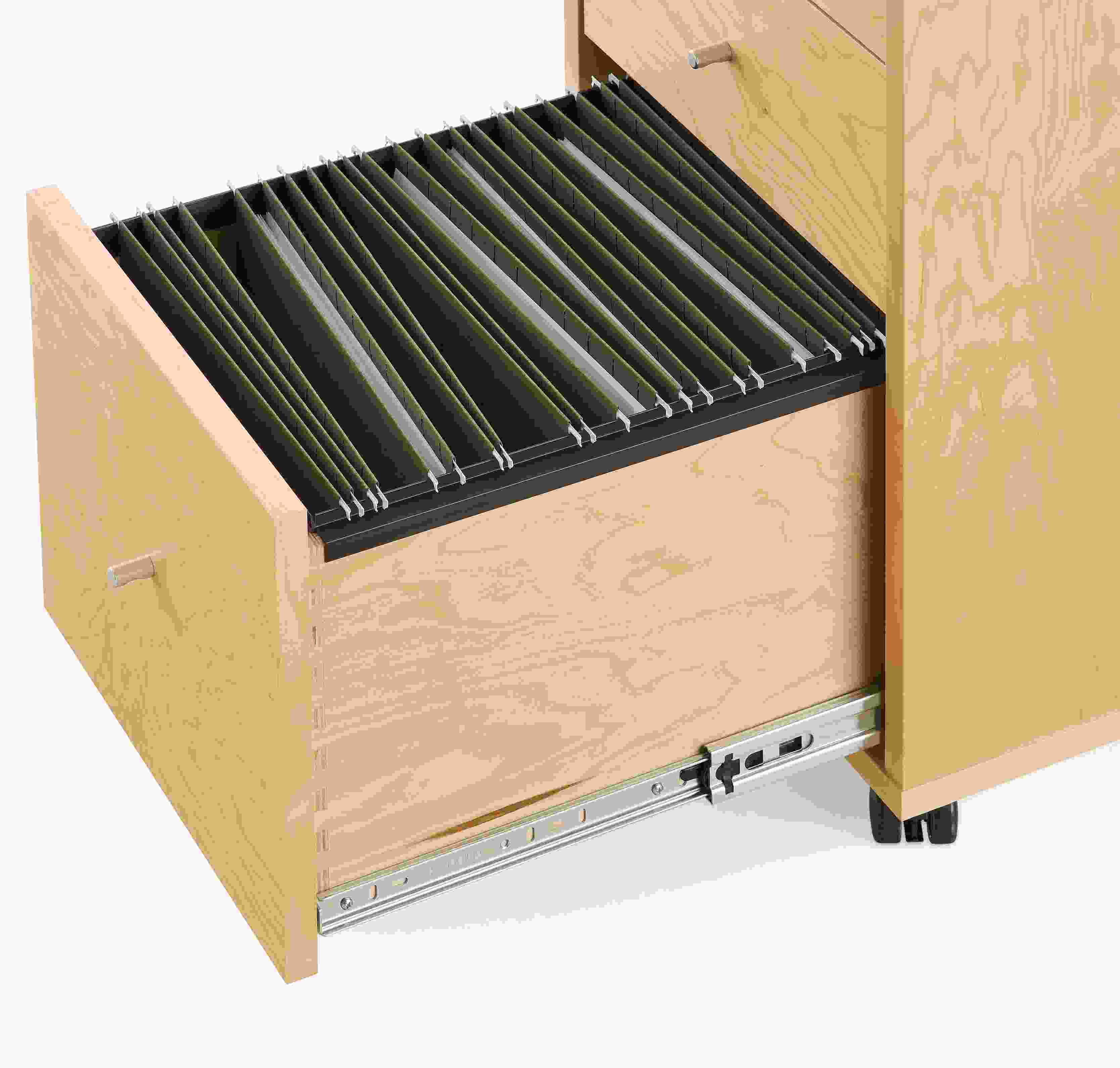 Detail of file drawer on Sequel 16-wide rolling file cabinet in Maple showing letter size file folders.