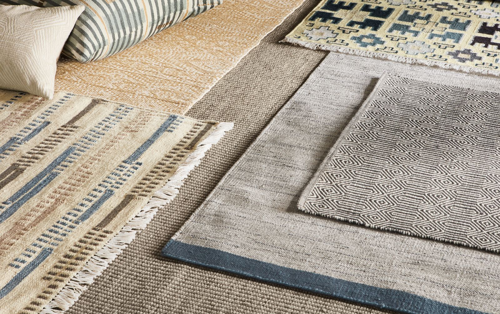 Detailed shot of indoor rugs including sequence and morse rugs.