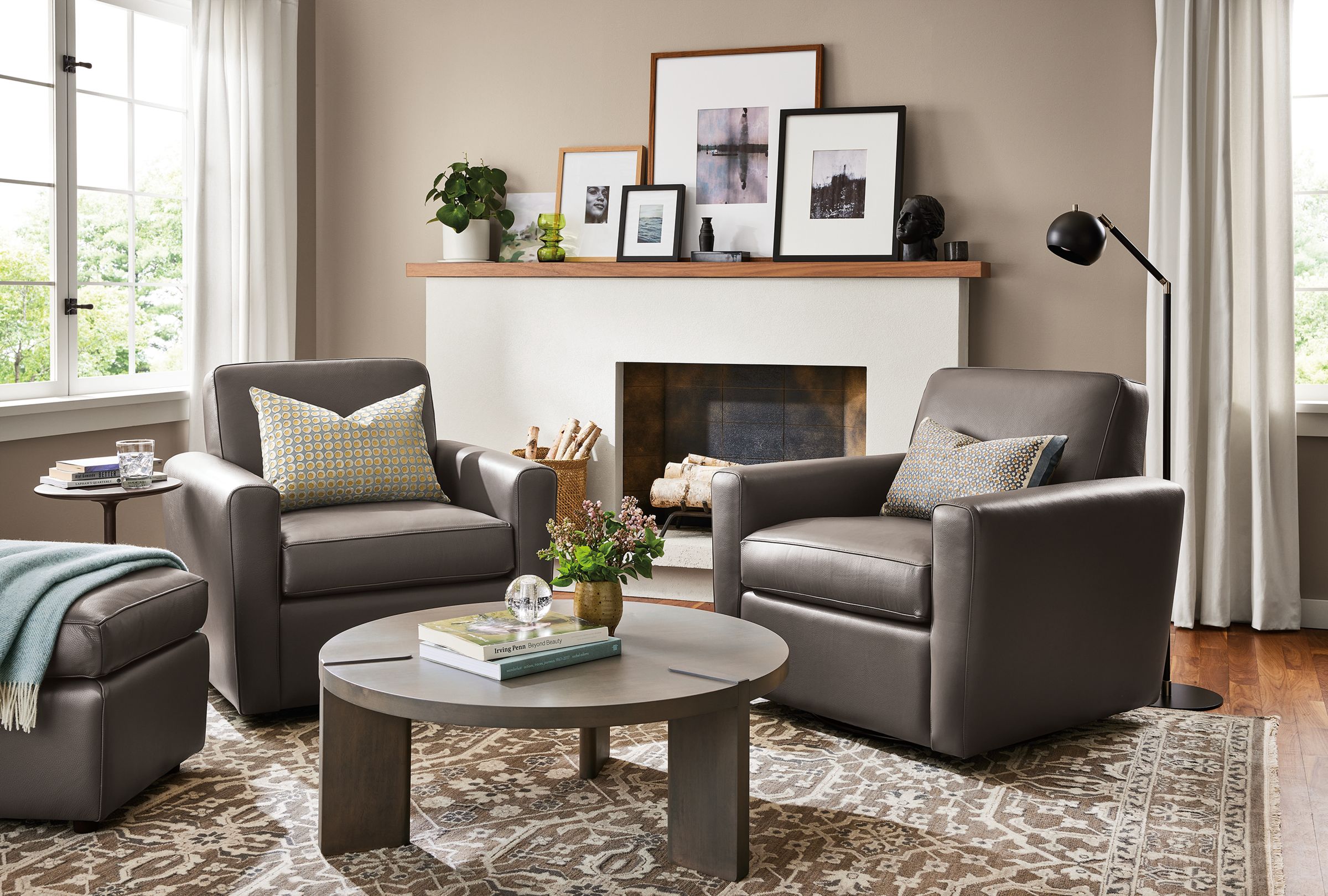 Living room with two Seth chairs in leather with Hanover coffee table.