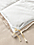 Close tie detail of queen Sheffield duvet cover in ivory.